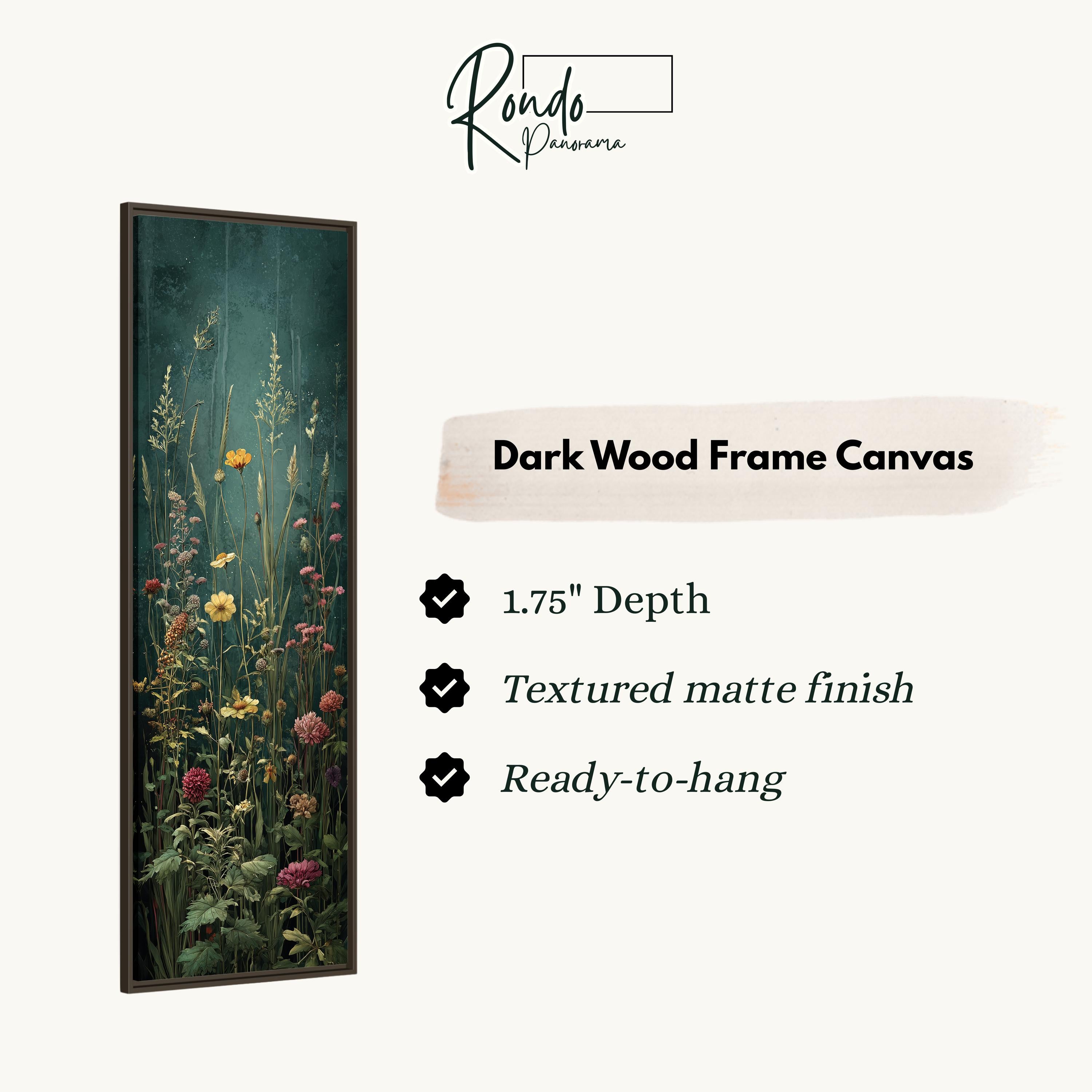 The image is a dark wood frame canvas featuring a vibrant floral scene with tall grasses and various colorful flowers.