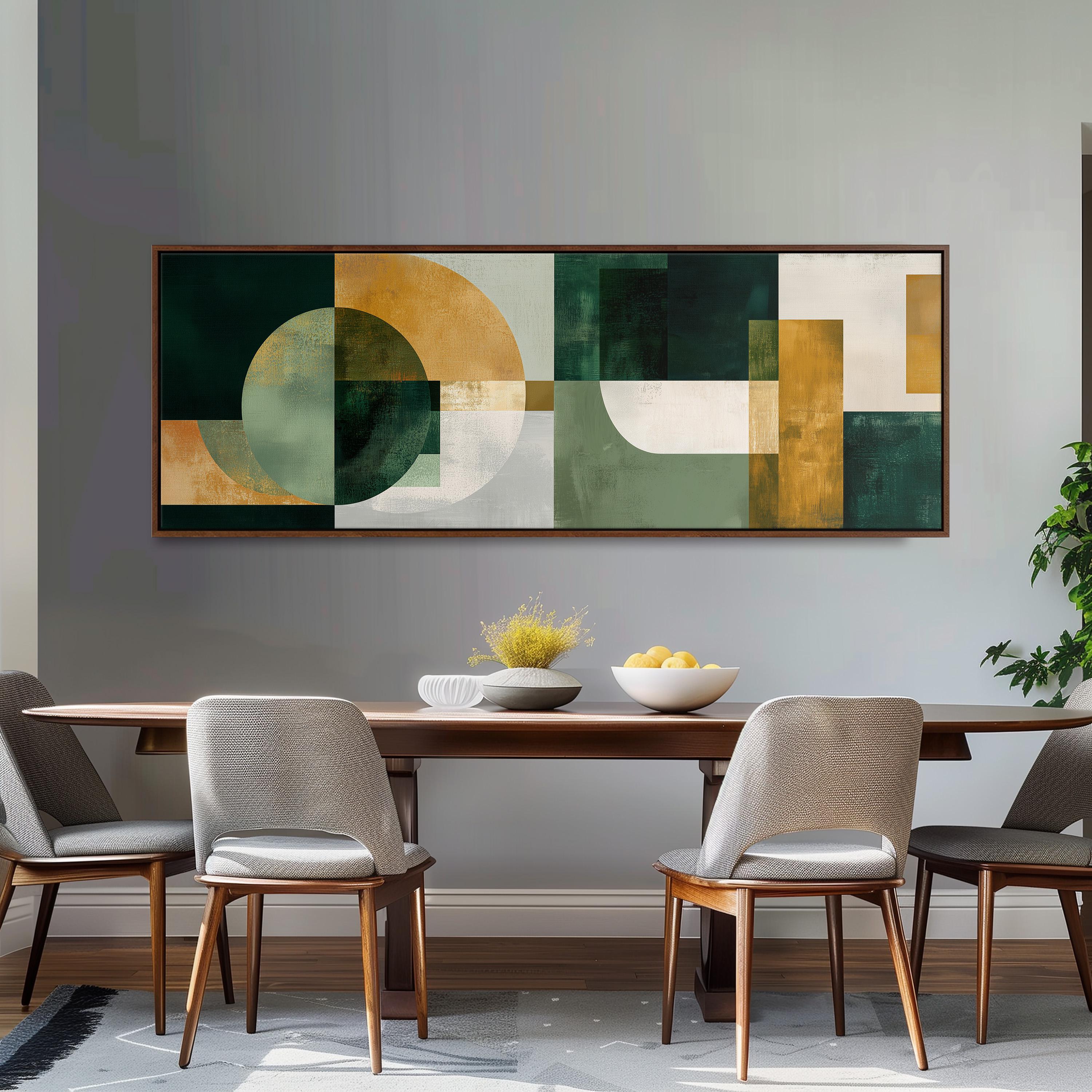 a modern dining room with a wooden table and four chairs. Above the table, there is a large abstract painting with a geometric design in various shades of green, yellow, and white. The painting is framed and hangs on the wall above the table.