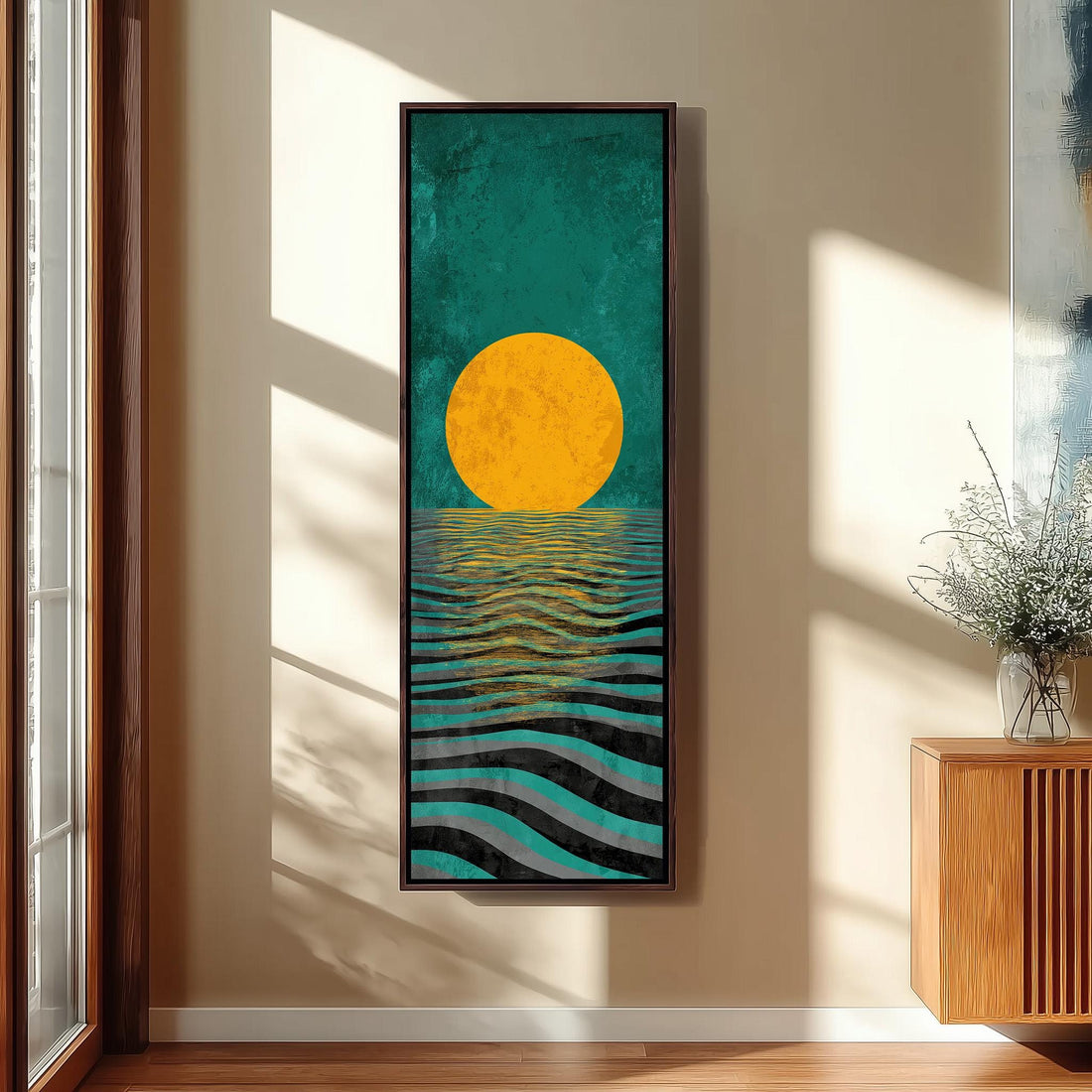 a large, colorful painting of a sunset over the ocean, hanging on the wall of a hallway.