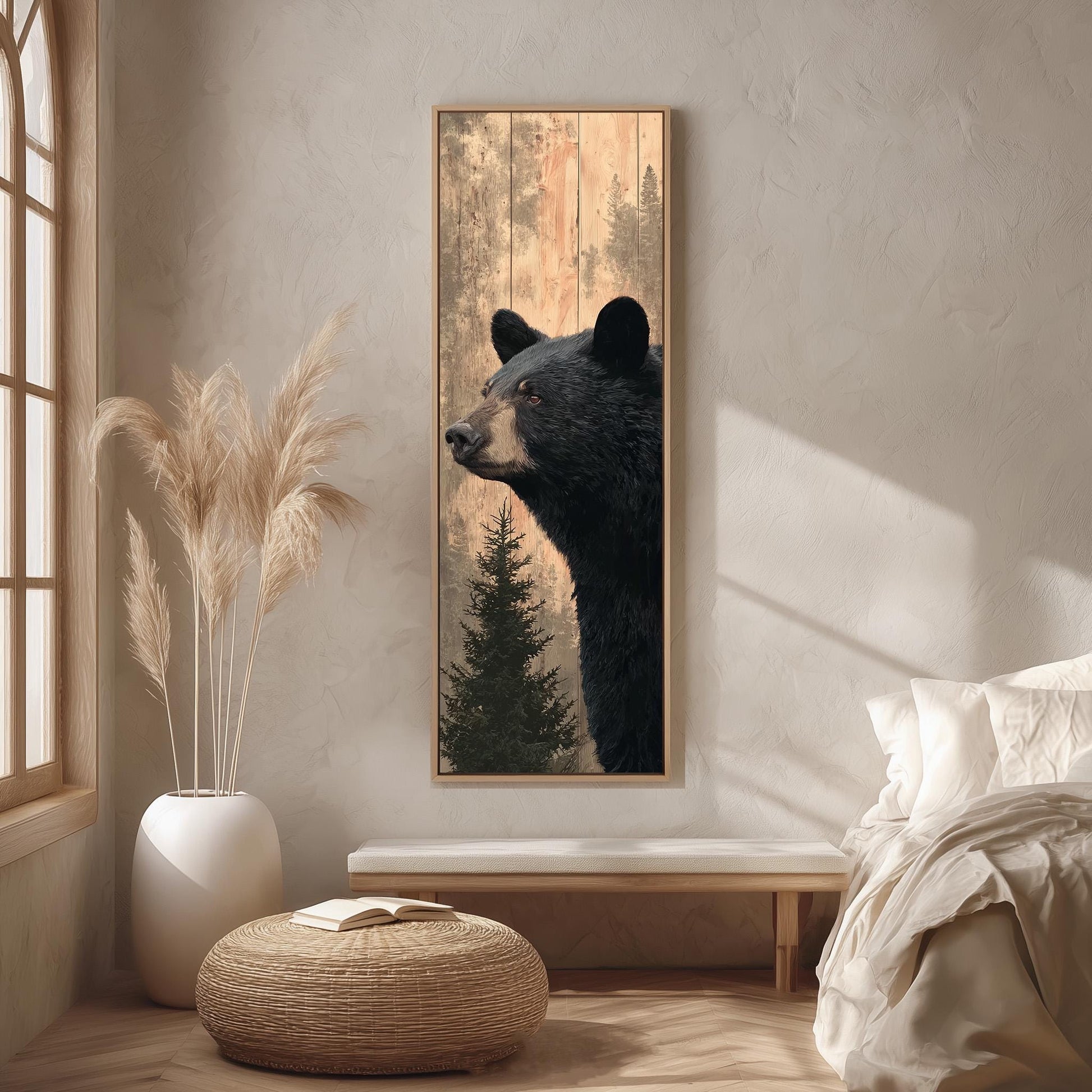 a large black bear in profile, hanging on a wall in a room with a window, a white vase, and a woven ottoman.