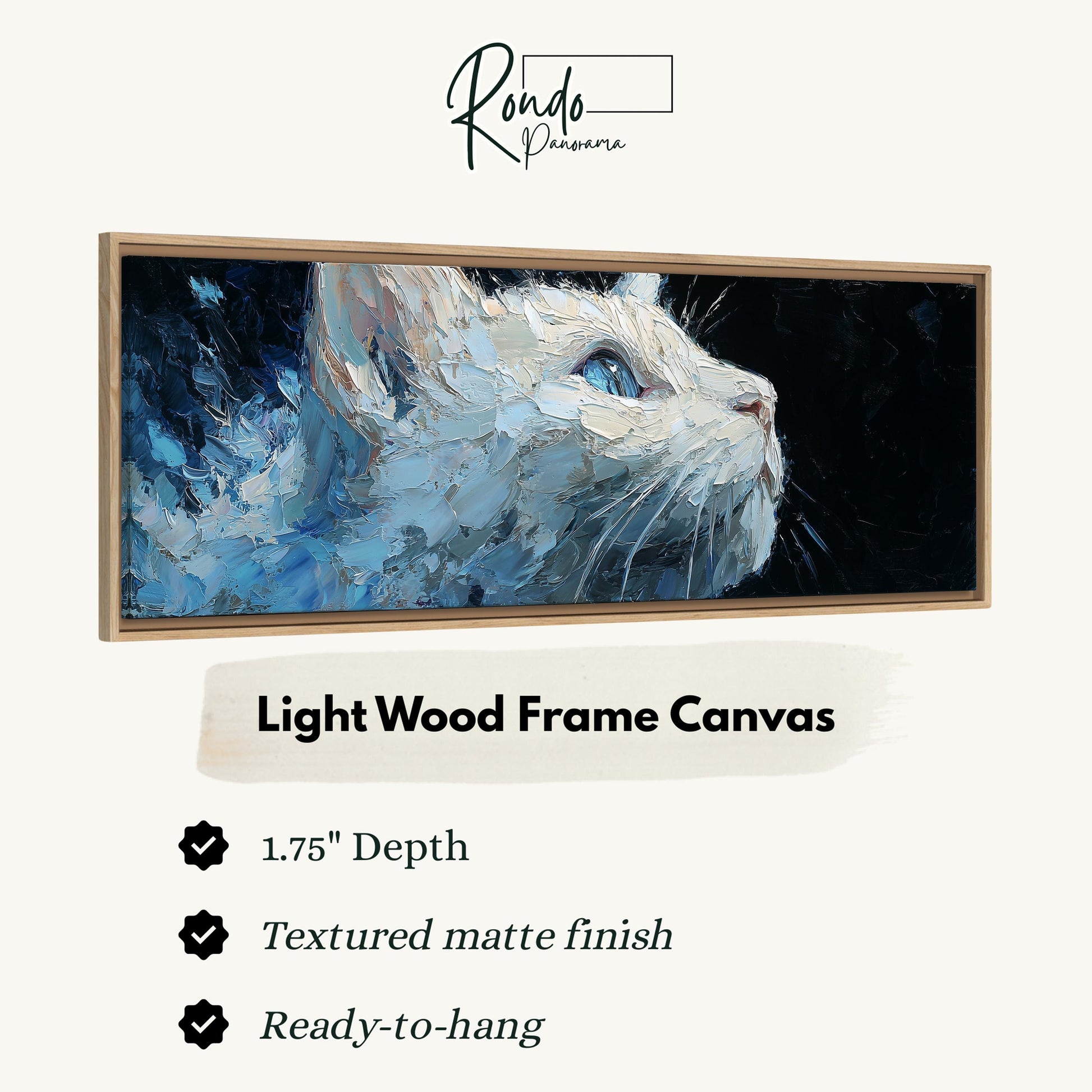 The image is a framed artwork depicting a close-up of a cat's face, with a light wood frame.