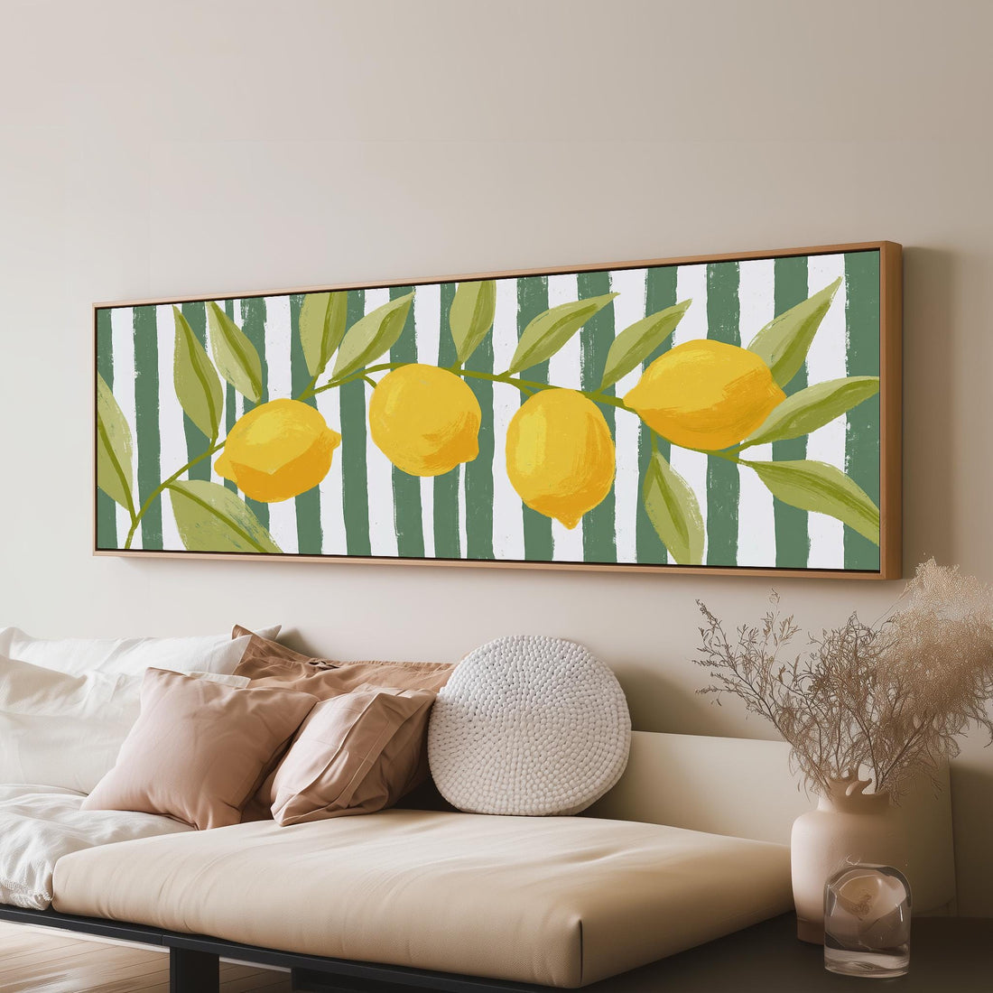Lemon branch on green stripes long horizontal canvas print above a sofa in a living room