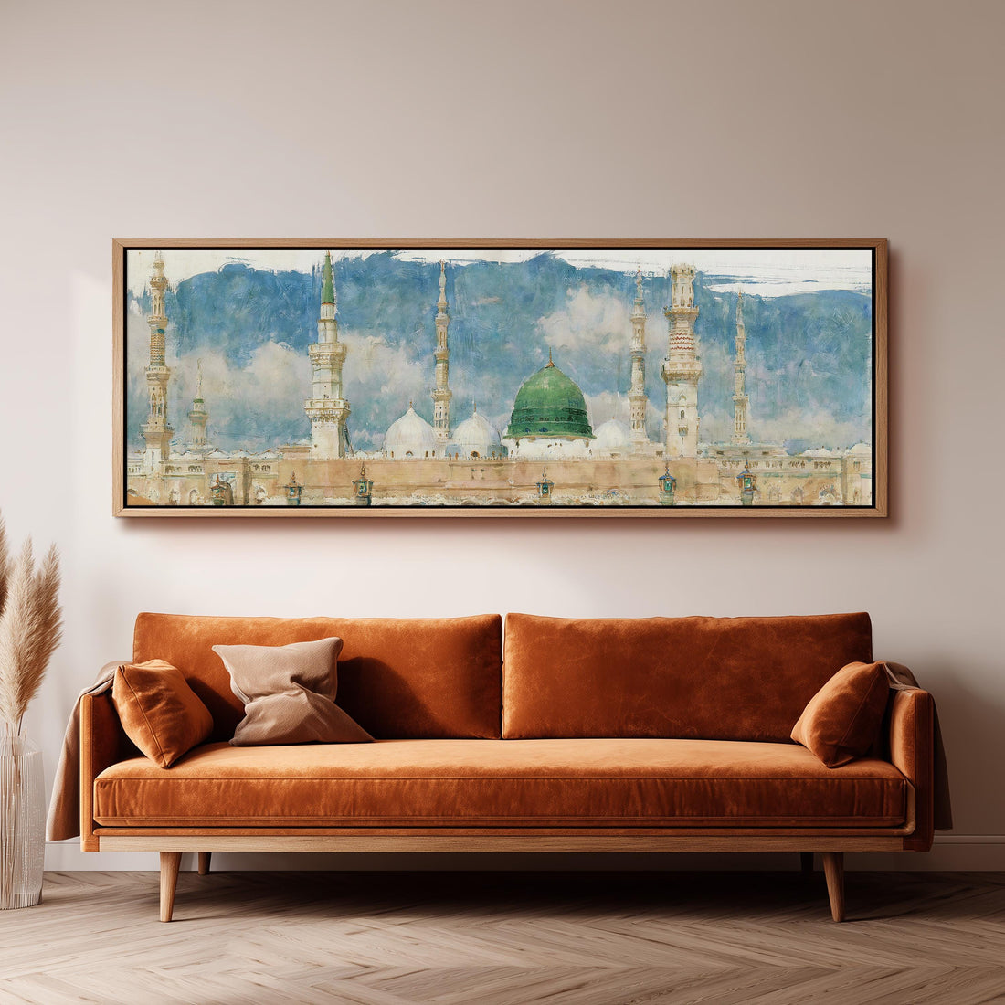 The green dome of the Prophet's Mosque in Medina long horizontal canvas print above a sofa in a living room