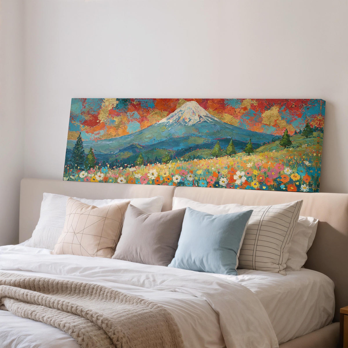 Mount Fuji under a red and gold sunset sky wide panoramic canvas print above a bed in a bedroom