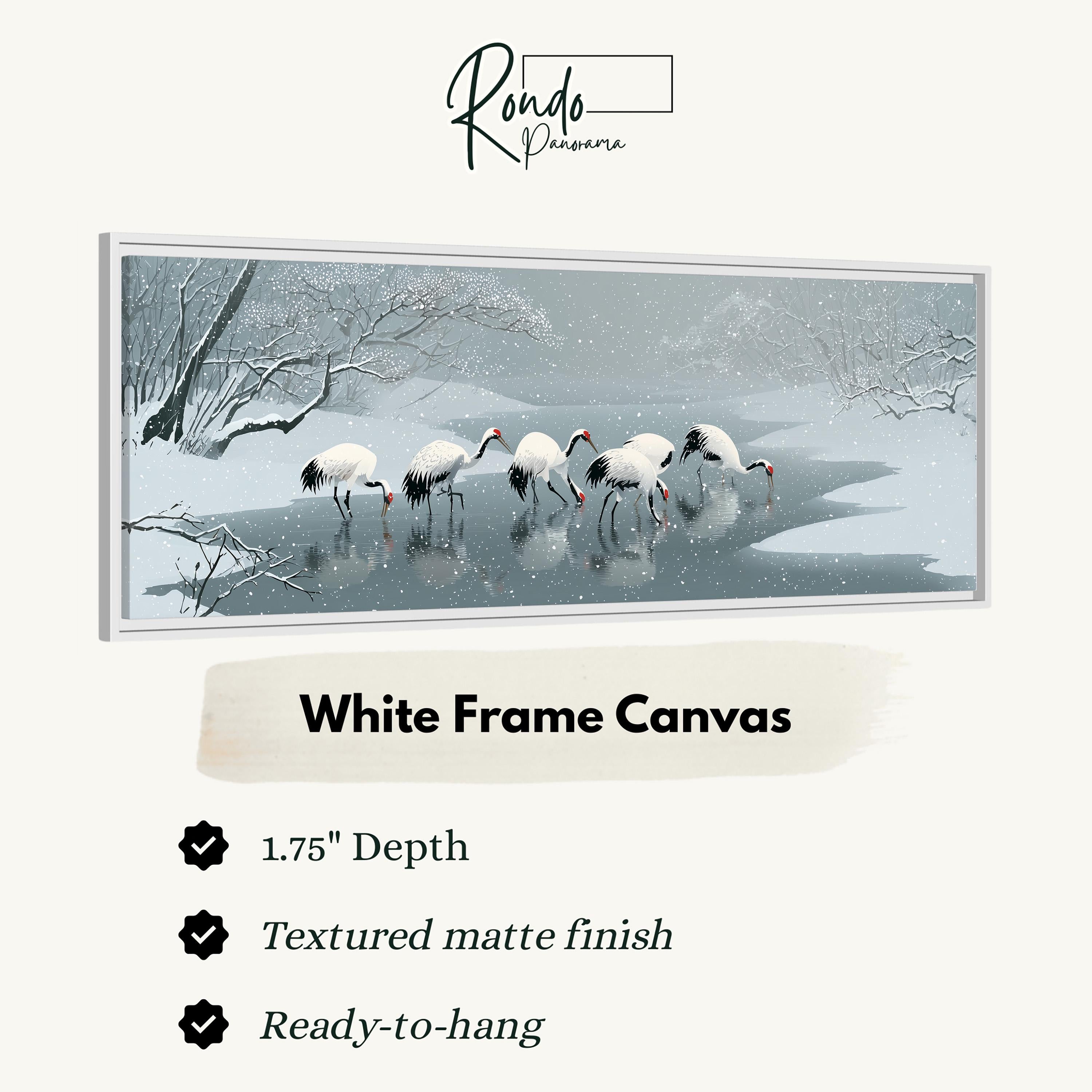 A white frame canvas depicting a snowy landscape with a group of white birds wading in the water.