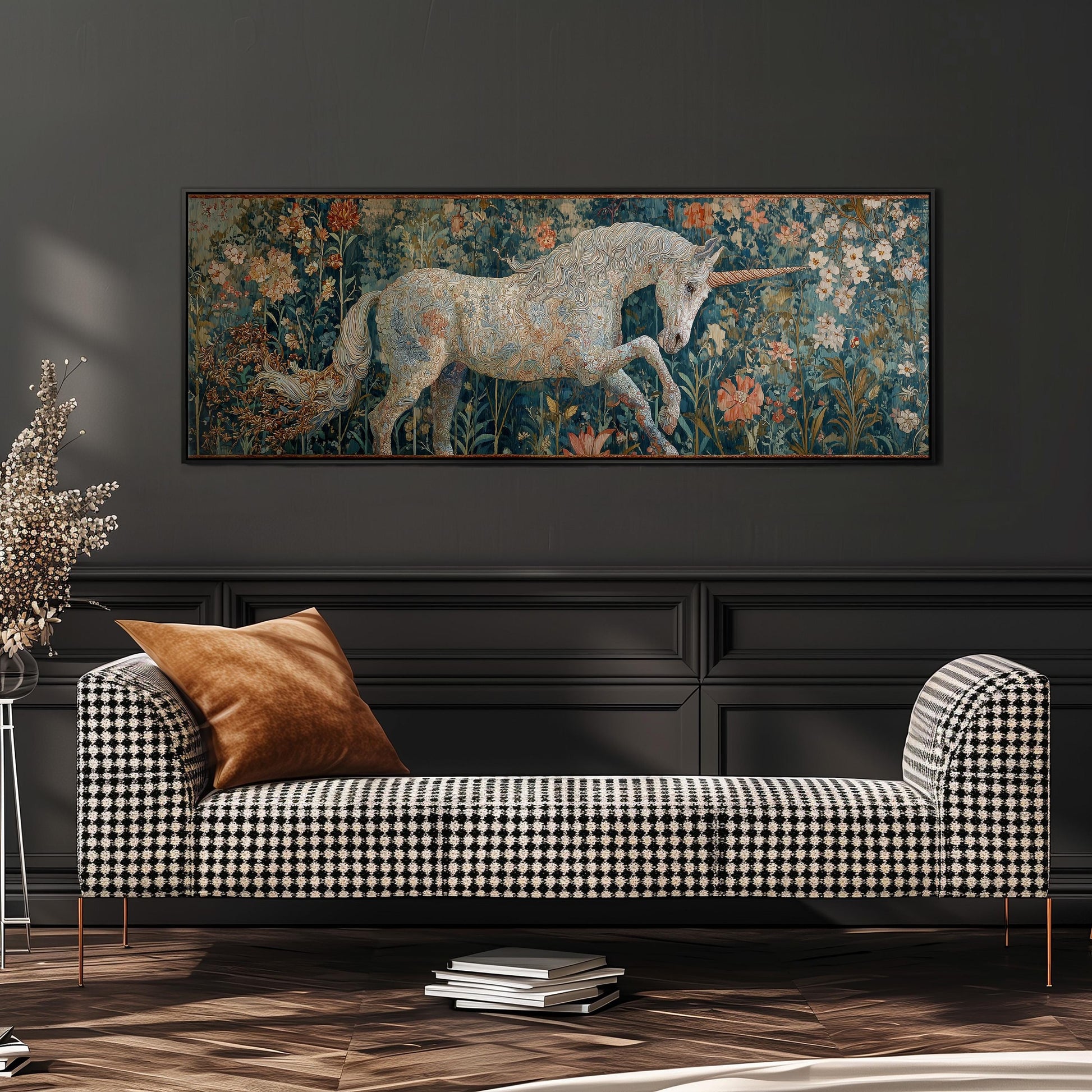 a large painting of a unicorn in a field of flowers, hanging on a wall above a black and white checkered sofa.