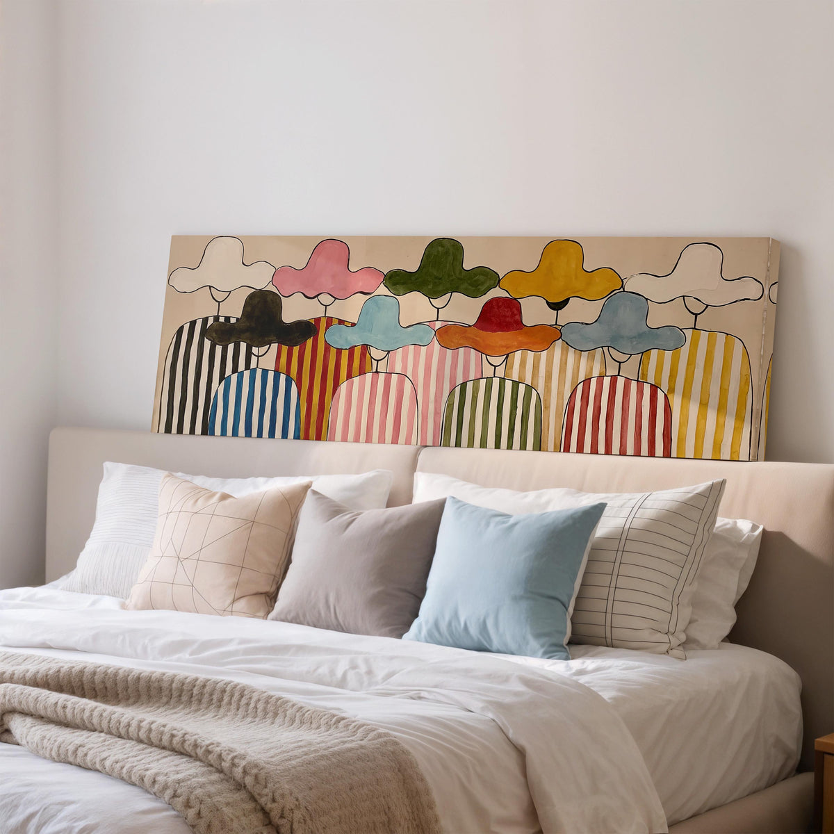 Gathering of figures in straw hats and stripes wide panoramic canvas print above a bed in a bedroom