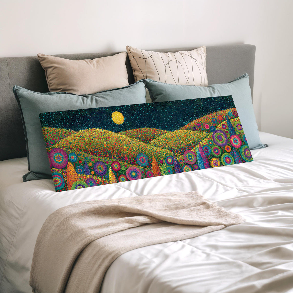 Moonlit flower hills wide panoramic canvas print laid on a bed to show its size