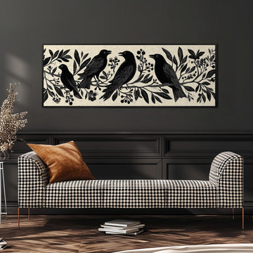 a black and white checkered sofa with a brown throw pillow, set against a dark wall with a framed artwork of black birds on branches above it.