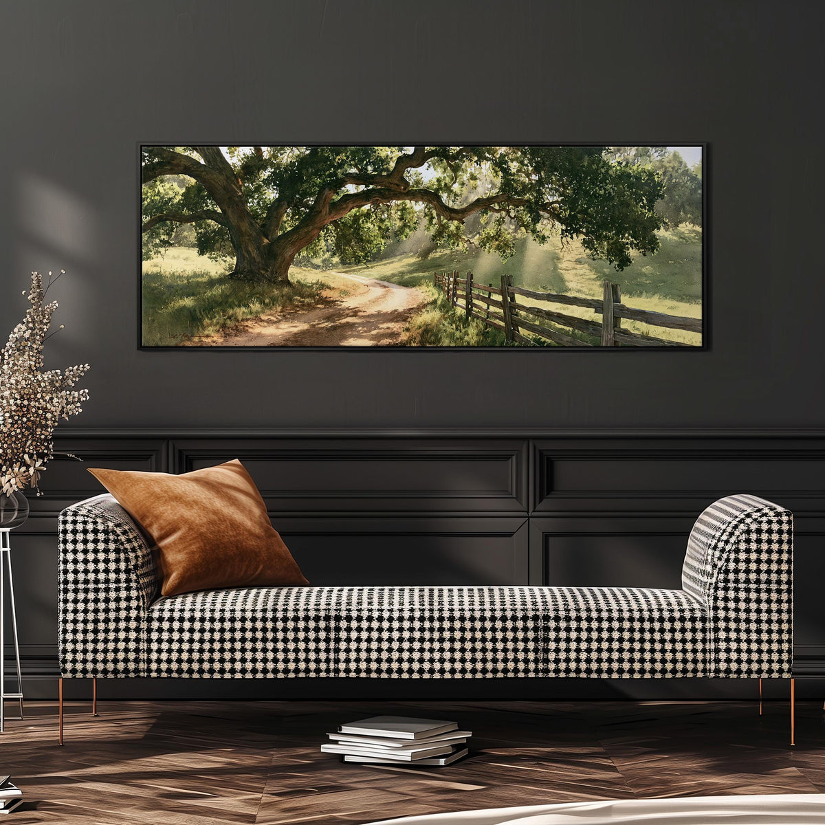 Sunlit country lane with oak trees and a wooden fence wide panoramic canvas print above a bench in a dark living room