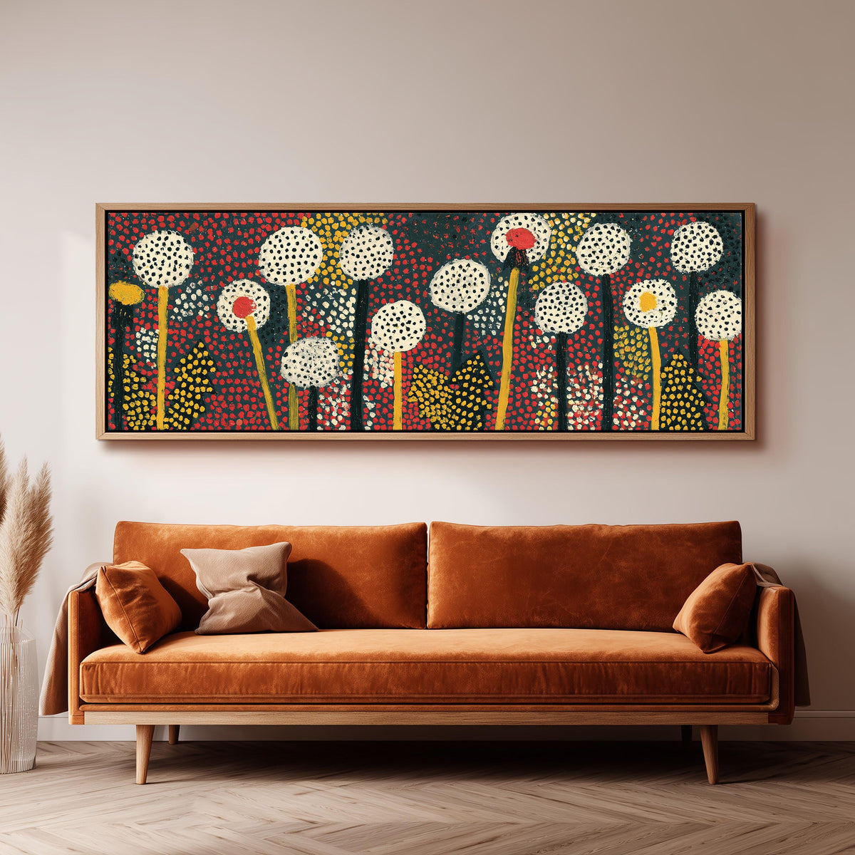 Dotted dandelion meadow long horizontal canvas print above a sofa in a living room