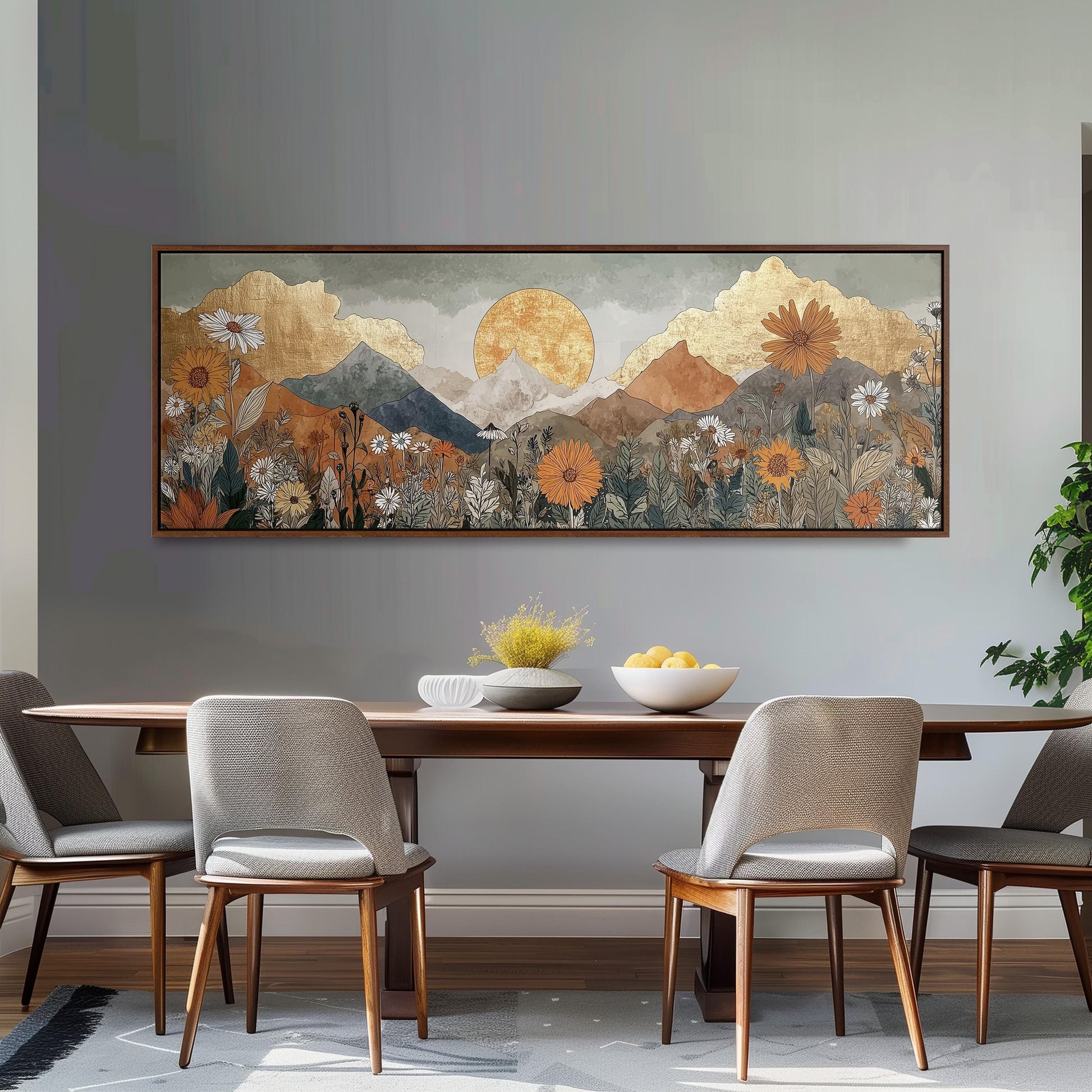 a dining room with a large, colorful painting of a mountain landscape hanging on the wall above a wooden dining table with four chairs. The painting depicts a serene and picturesque scene with mountains, flowers, and a sun in the sky.