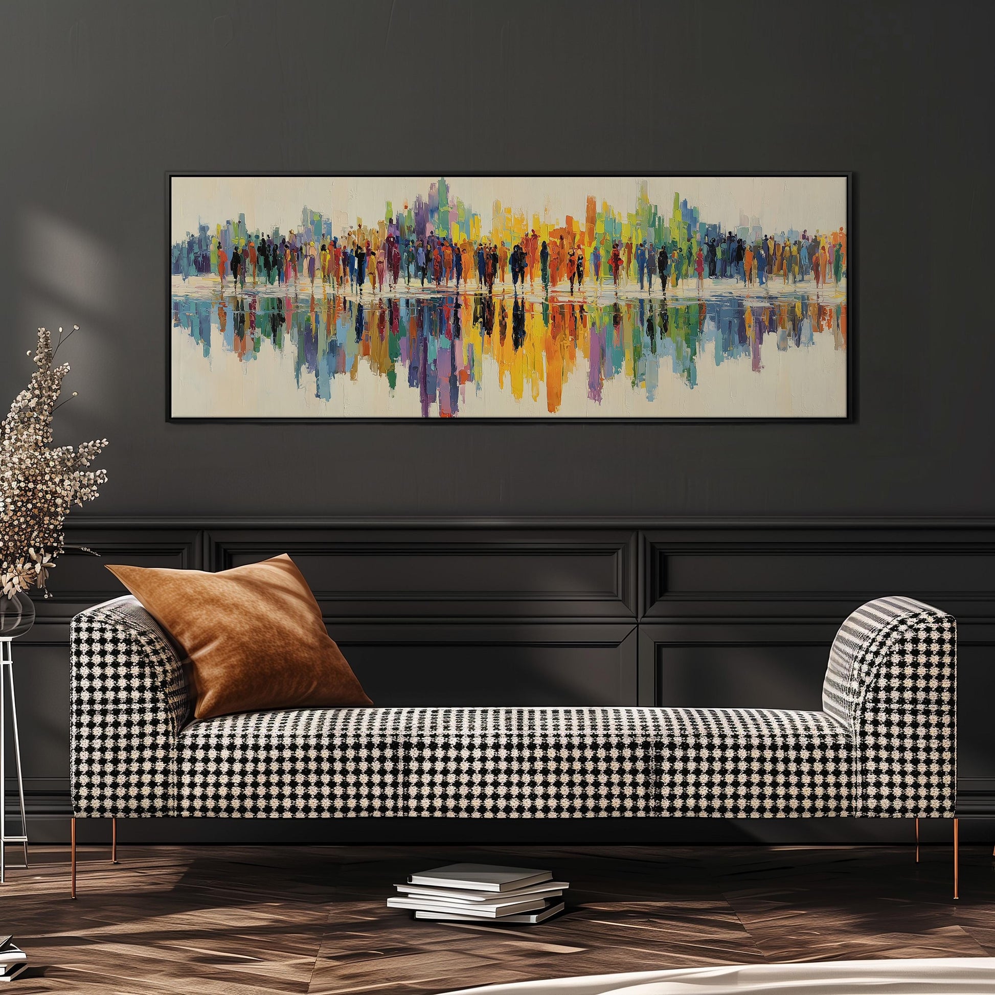 a modern living room with a black and white checkered sofa, a stack of books, and a large abstract painting hanging on the wall above the sofa.