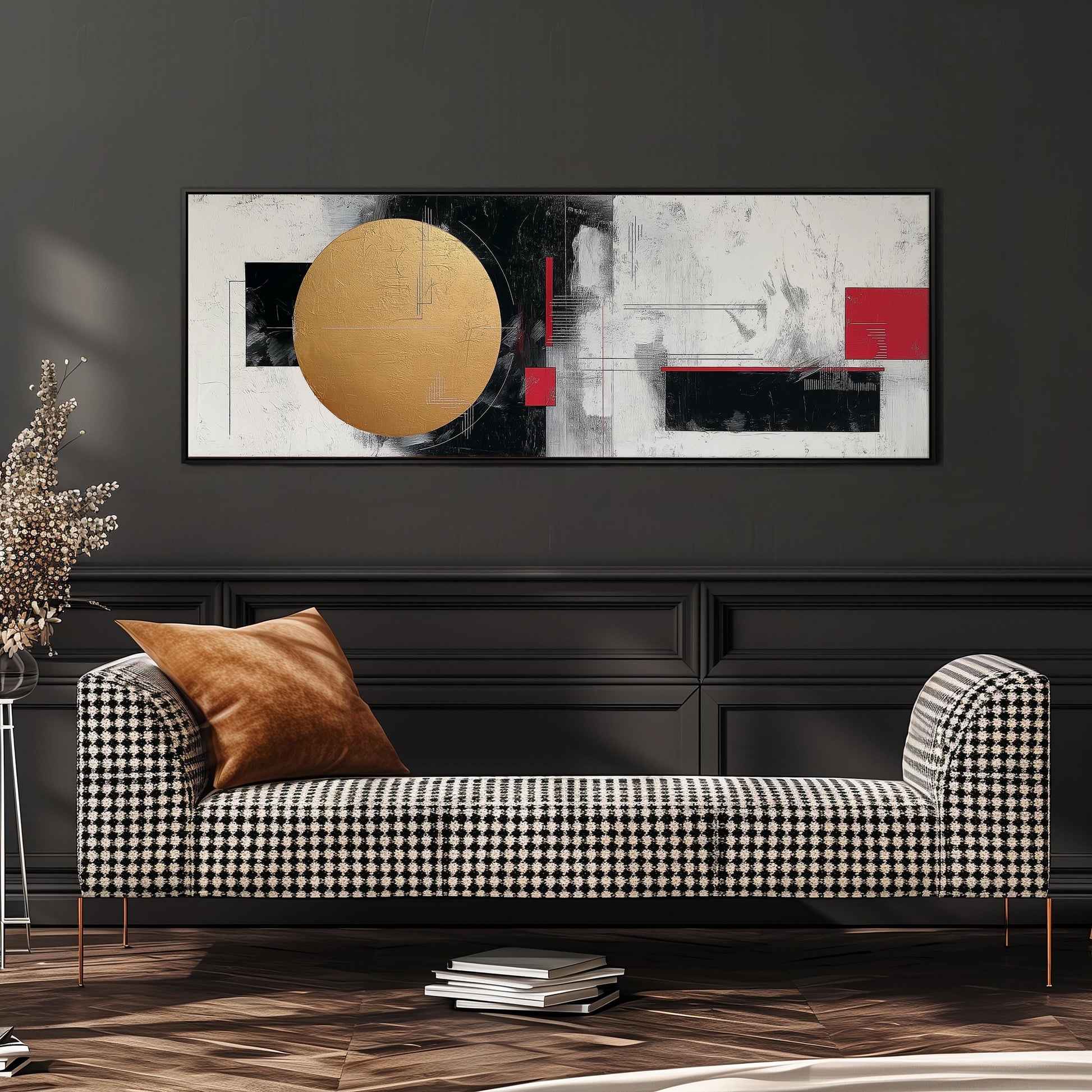 a modern living room with a black and white checkered sofa, a large abstract painting on the wall, and a stack of books on the floor.