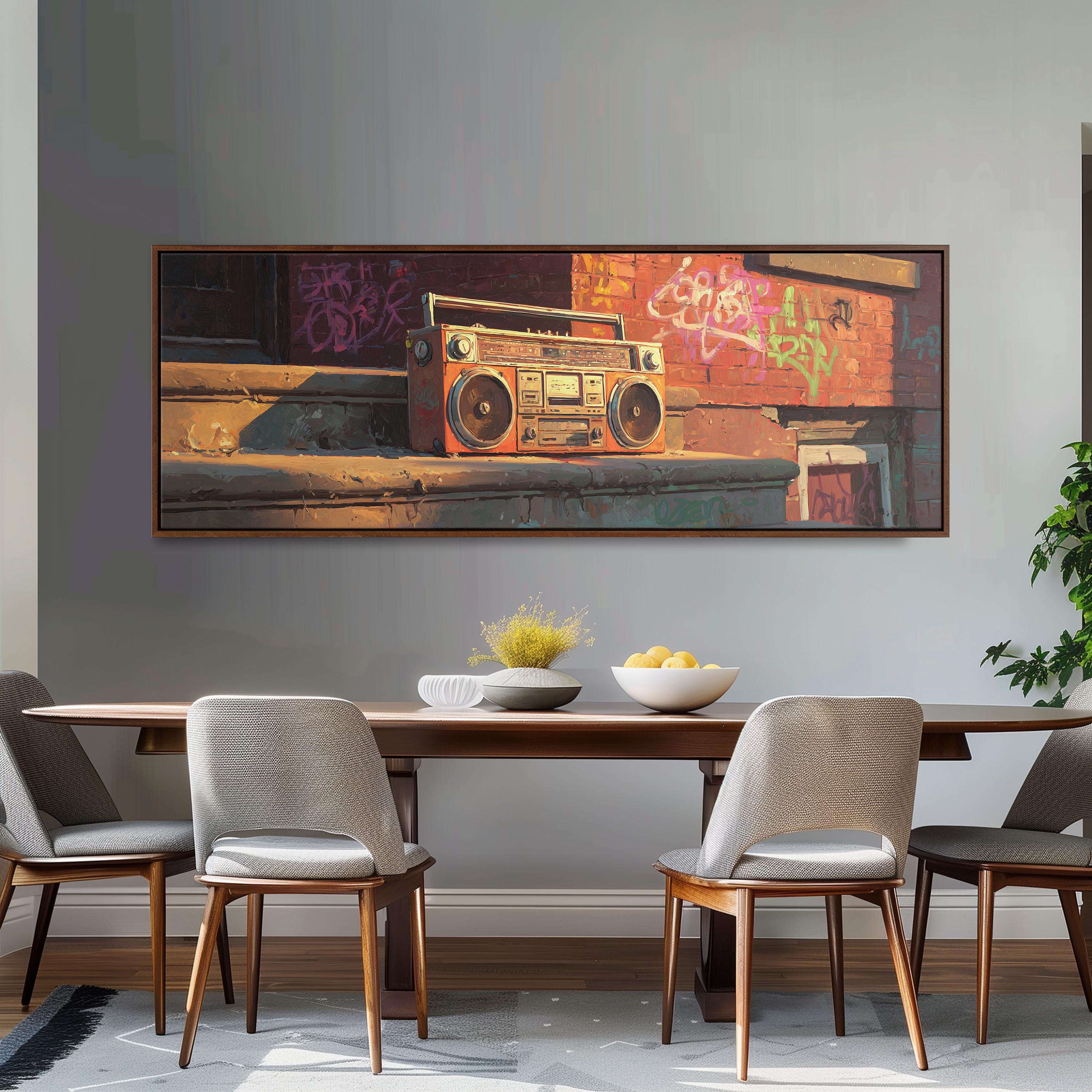 a large painting of a vintage boombox on a wall above a wooden dining table with four chairs.