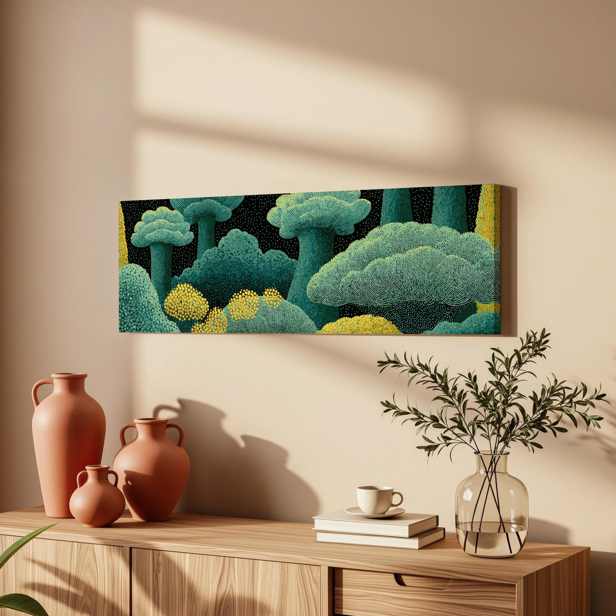 Teal dotted treetops long horizontal canvas print above a wooden sideboard