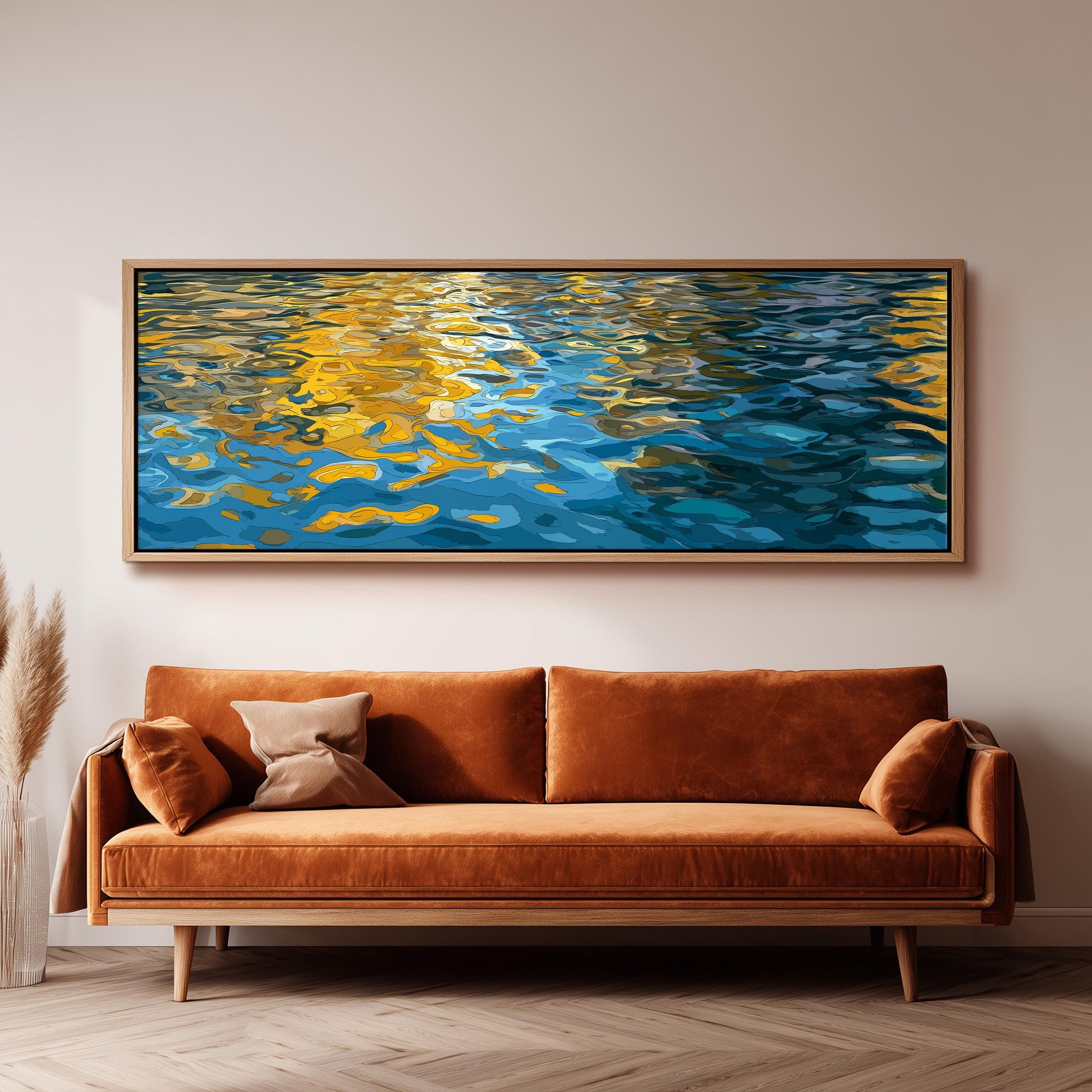 a large, rectangular painting hanging on a wall above a brown sofa.
