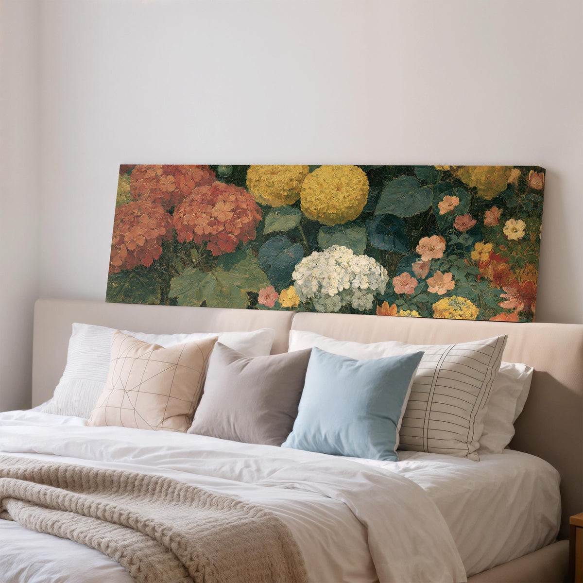 Warm hydrangea and dahlia bouquet wide panoramic canvas print above a bed in a bedroom