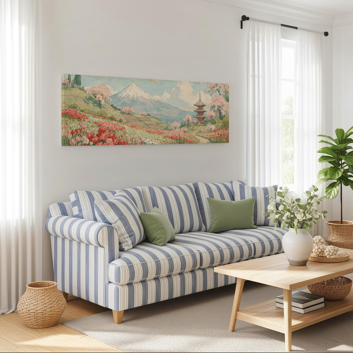 Mount Fuji with sakura and a pagoda long horizontal canvas print above a striped sofa in a coastal living room