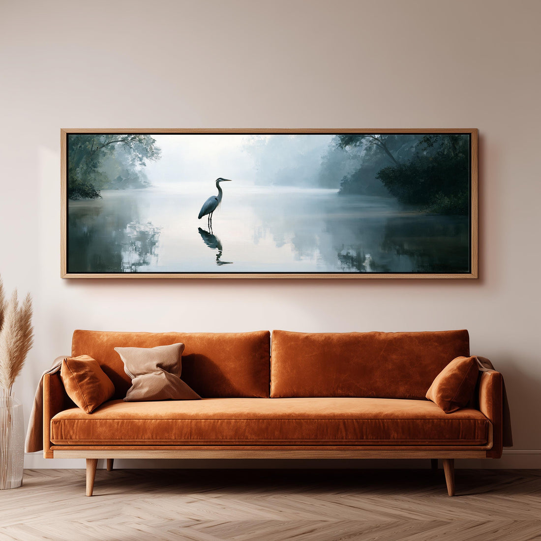 Heron standing in a misty wetland long horizontal canvas print above a sofa in a living room