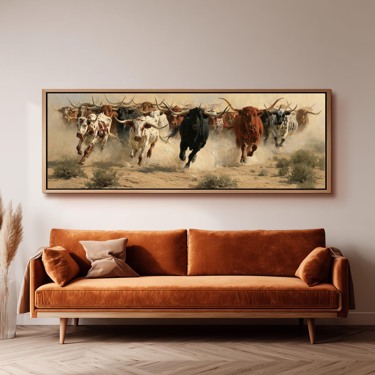 Charging longhorn herd panoramic canvas print above a sofa in a living room