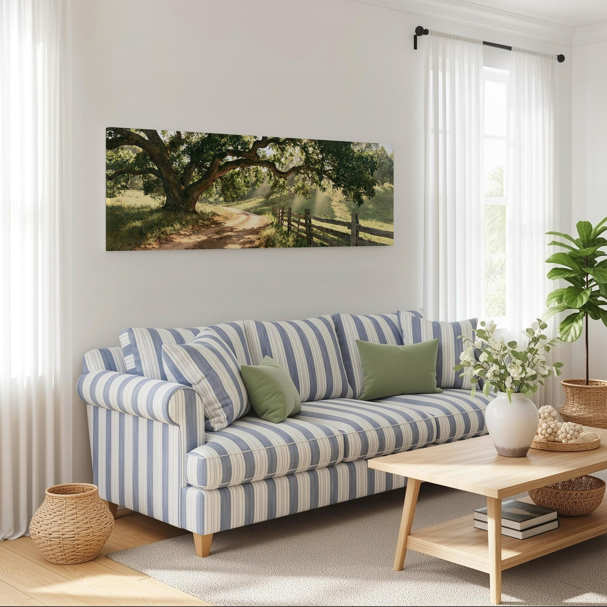 Sunlit country lane with oak trees and a wooden fence long horizontal canvas print above a striped sofa in a coastal living room