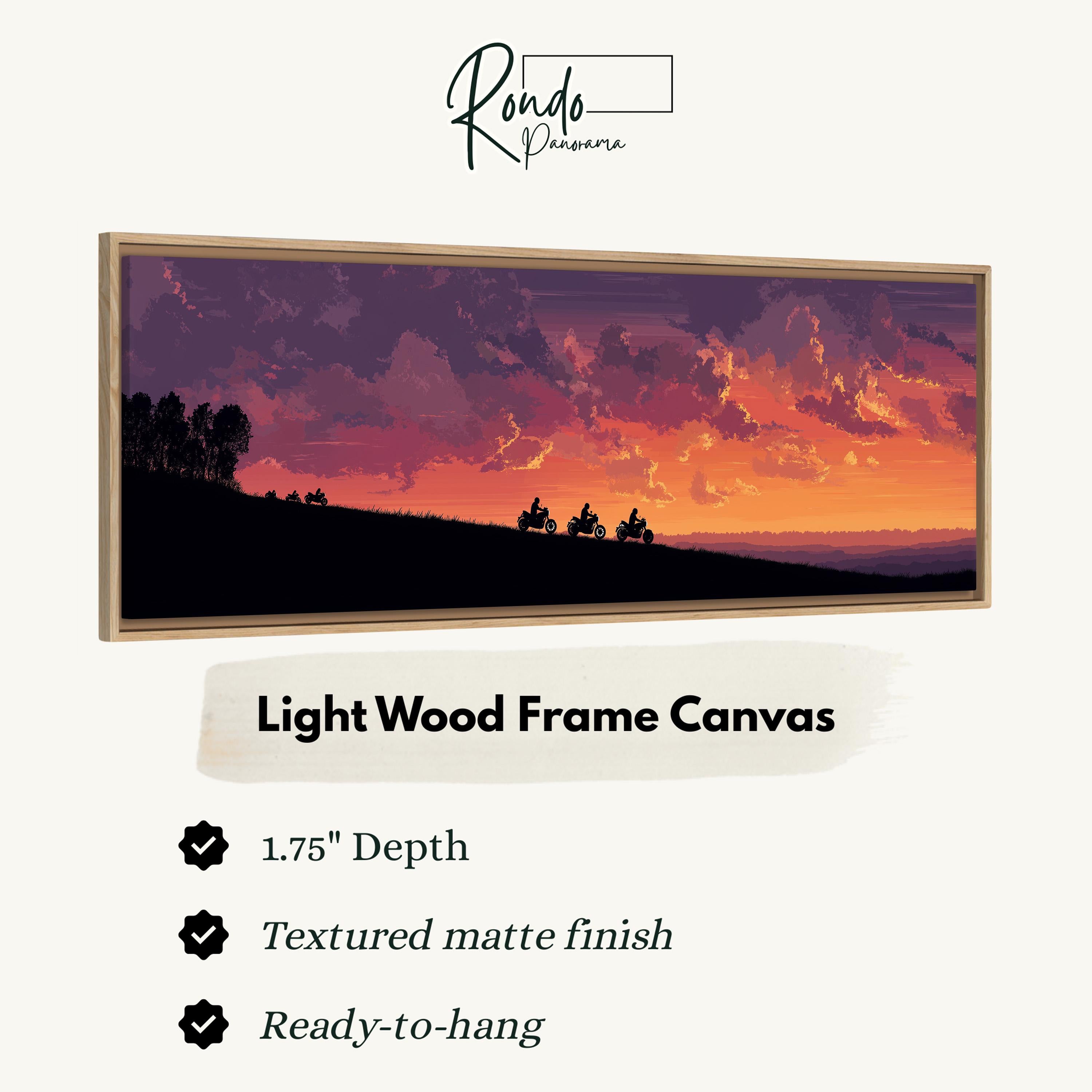 The image is a light wood frame canvas depicting a sunset over a hill with silhouetted figures riding motorcycles.
