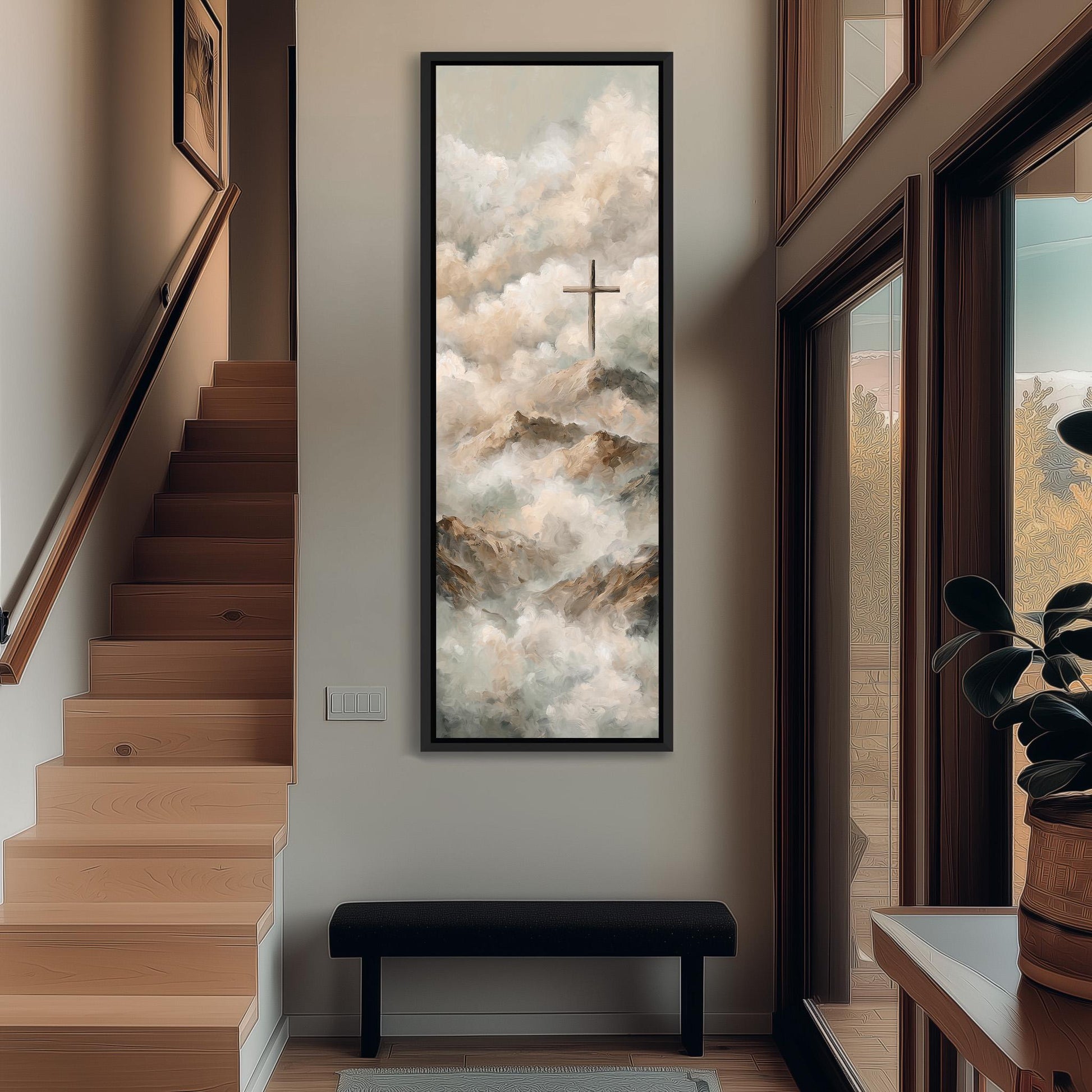 a large painting of a cross on a wall, with a mountainous landscape in the background. The painting is framed and hangs above a black bench in a hallway.