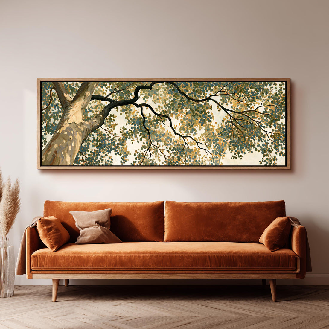 Dappled tree canopy seen from below long horizontal canvas print above a sofa in a living room