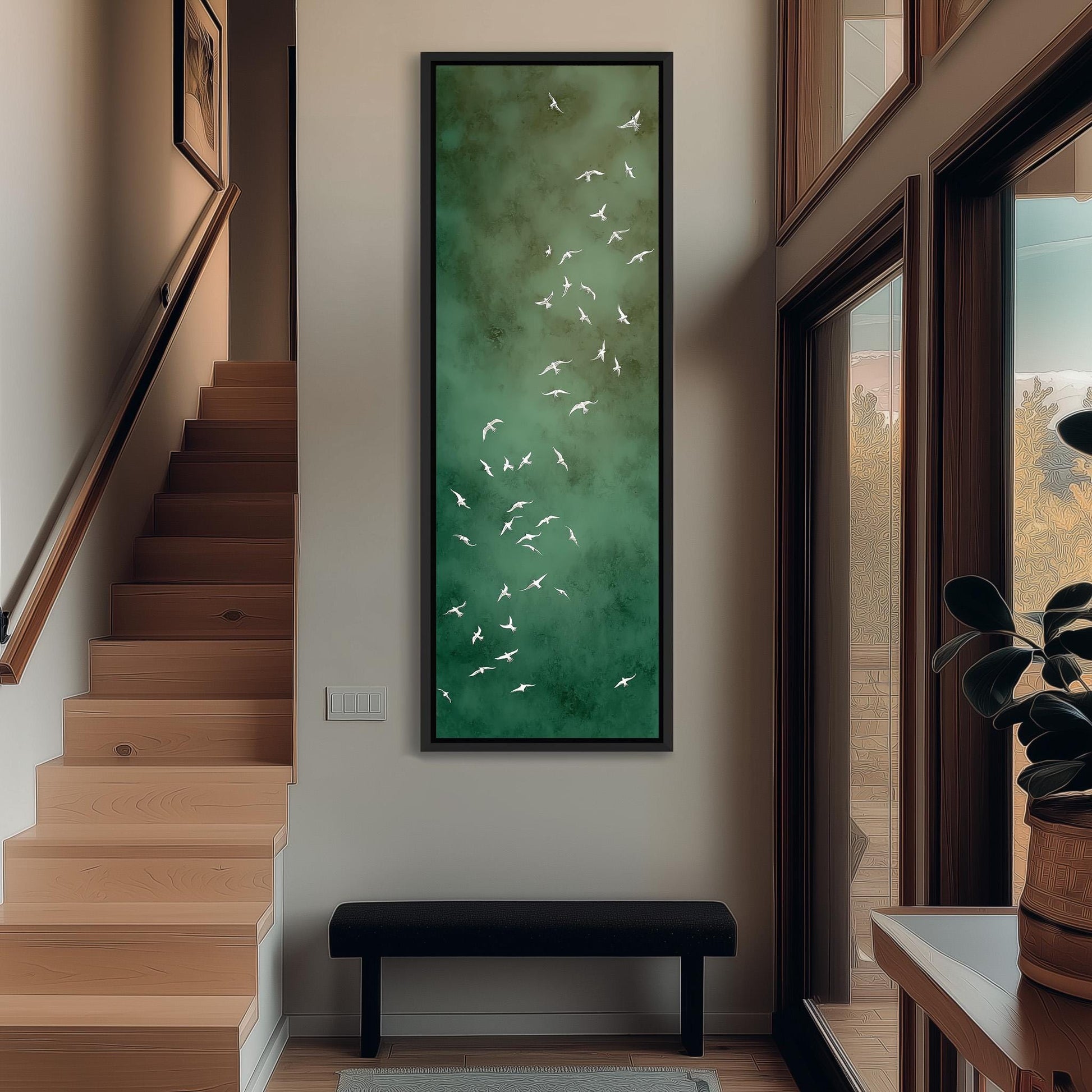 a modern and minimalist interior design, featuring a large painting of white birds against a green background hanging on the wall, a wooden staircase, a black bench, and a potted plant.