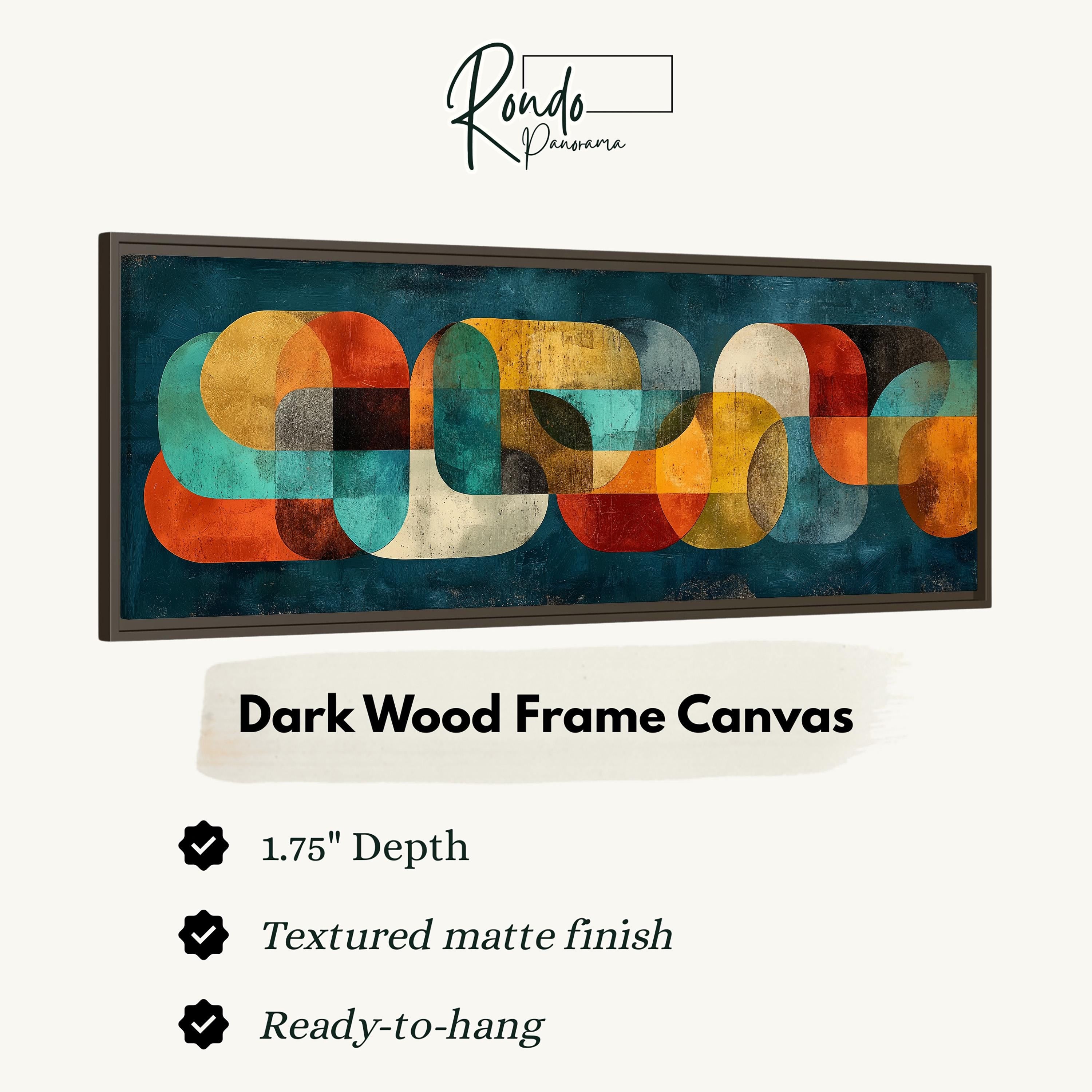 The image is a framed artwork with a dark wood frame. The artwork is a canvas with a geometric design featuring overlapping circles in various colors, including shades of blue, orange, and green. The frame has a 1.75" depth and is textured with a matte finish. It is ready to hang.