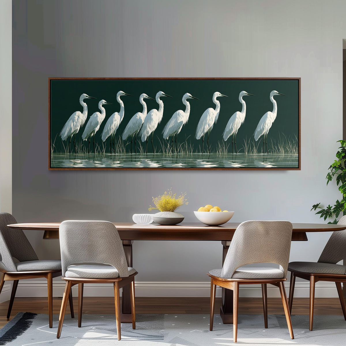 Row of white egrets on deep green long horizontal canvas print above a dining table