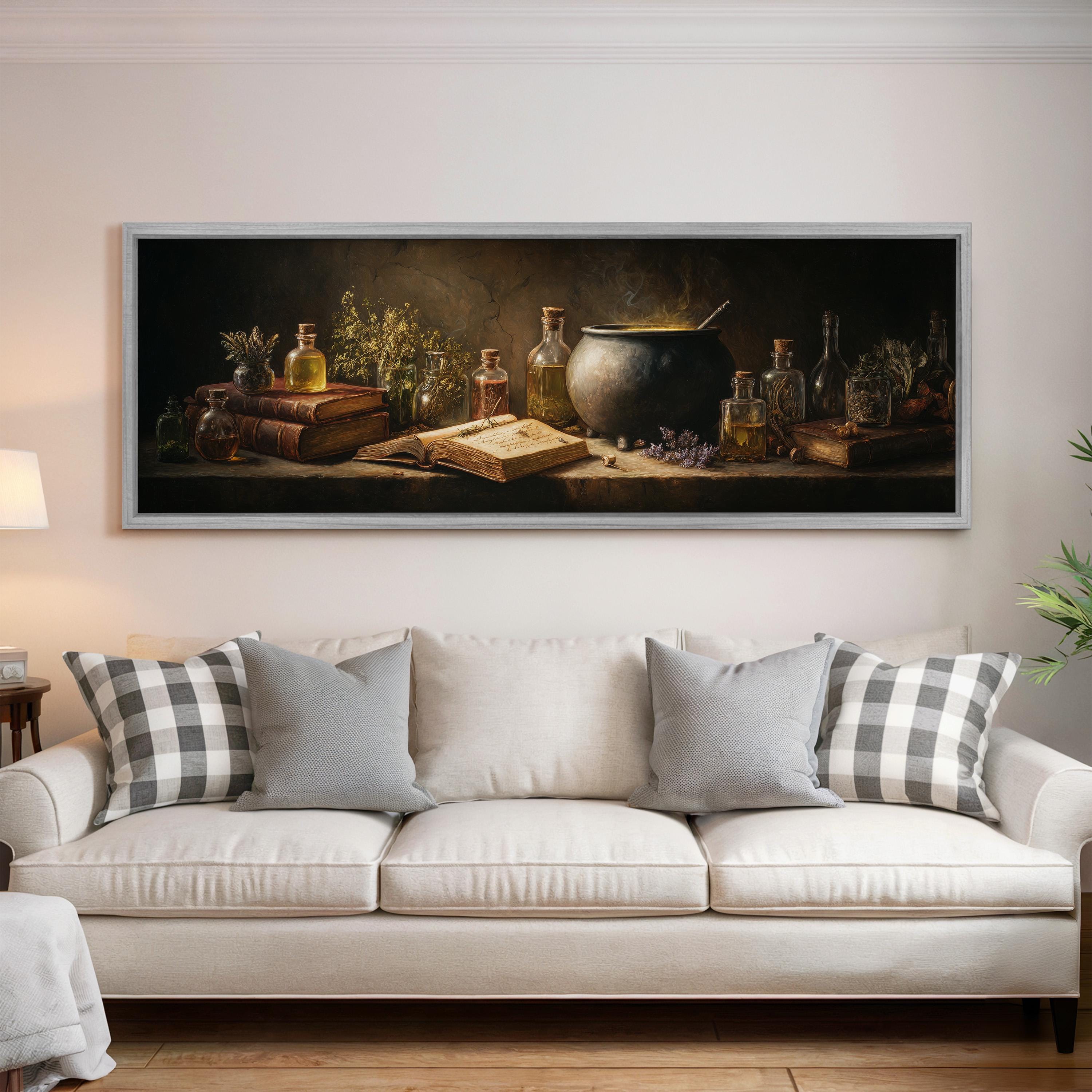 a cozy living room with a large painting of a still life scene hanging on the wall above a white sofa. The painting includes various objects such as books, bottles, and a cauldron, creating a warm and inviting atmosphere.