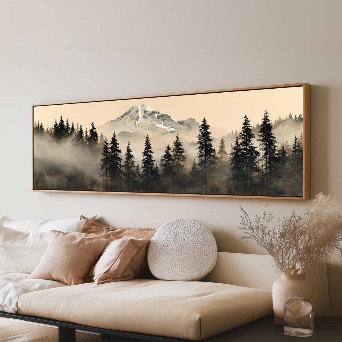 Foggy pine forest below a snowy mountain long horizontal canvas print above a sofa in a living room