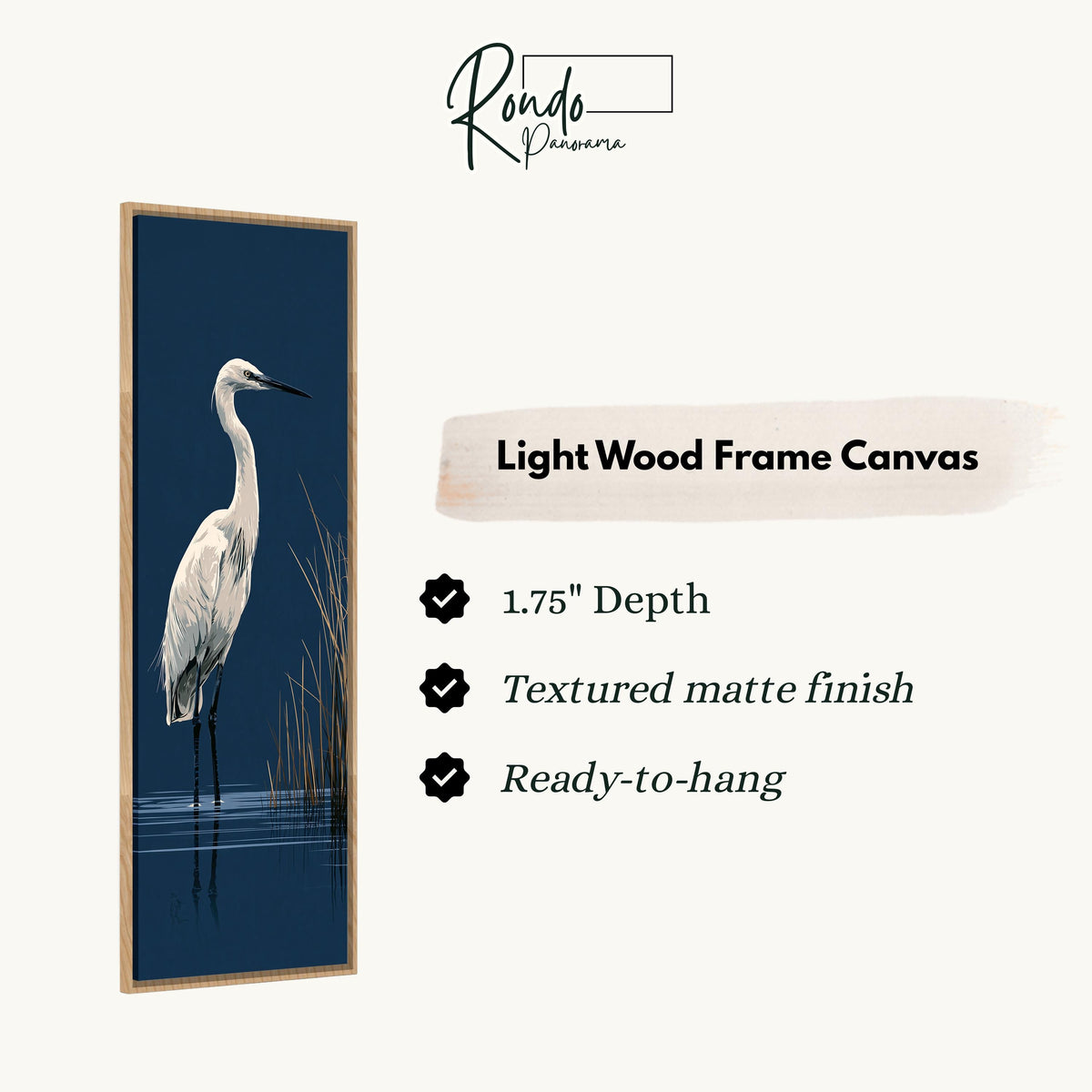 White egret wading on navy canvas print in a light wood floating frame