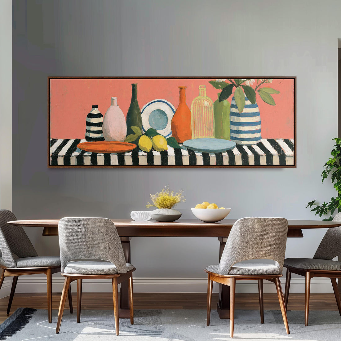 Bottles and lemons still life long horizontal canvas print above a sofa in a living room