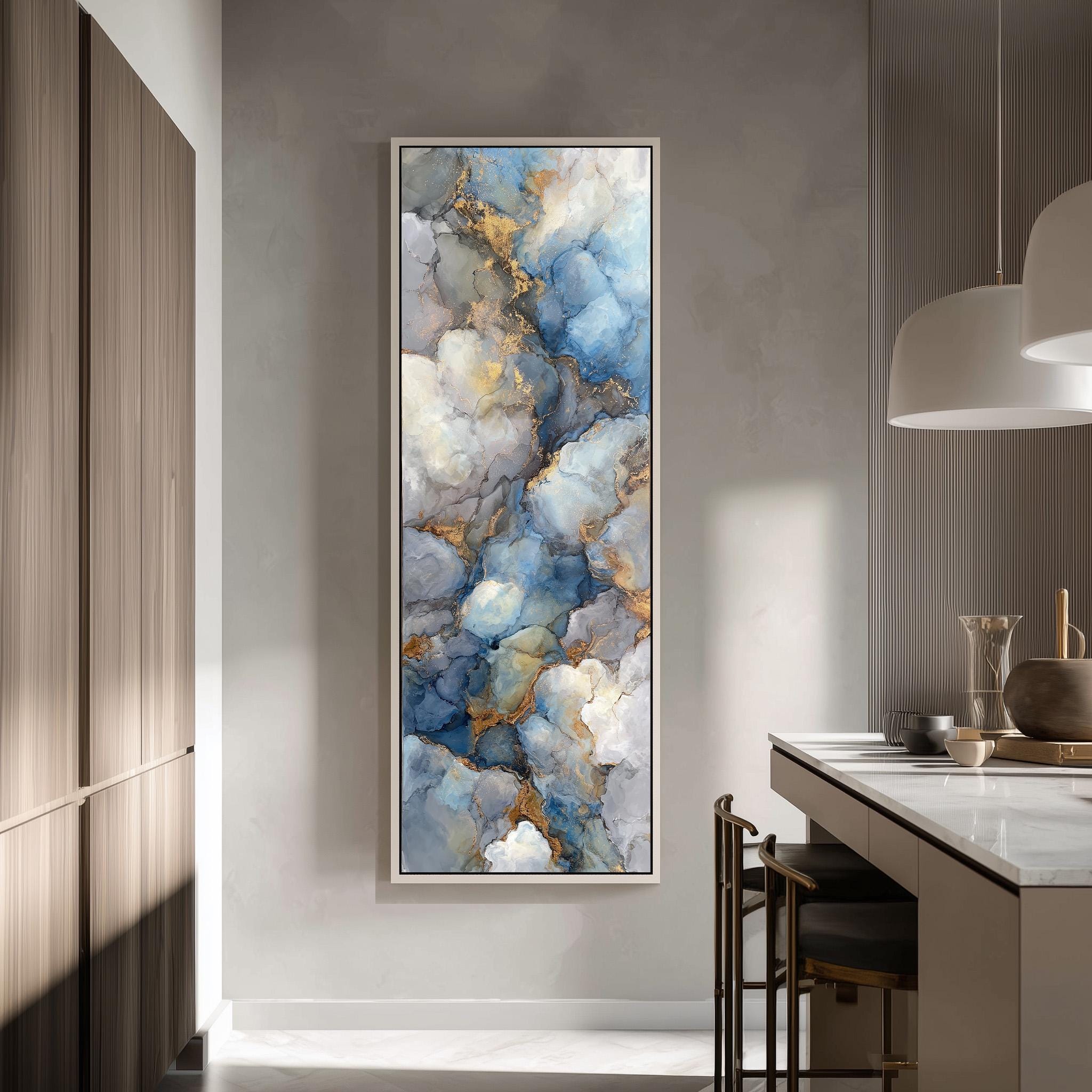 a large abstract painting hanging on a wall in a modern kitchen.