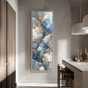 a large abstract painting hanging on a wall in a modern kitchen.