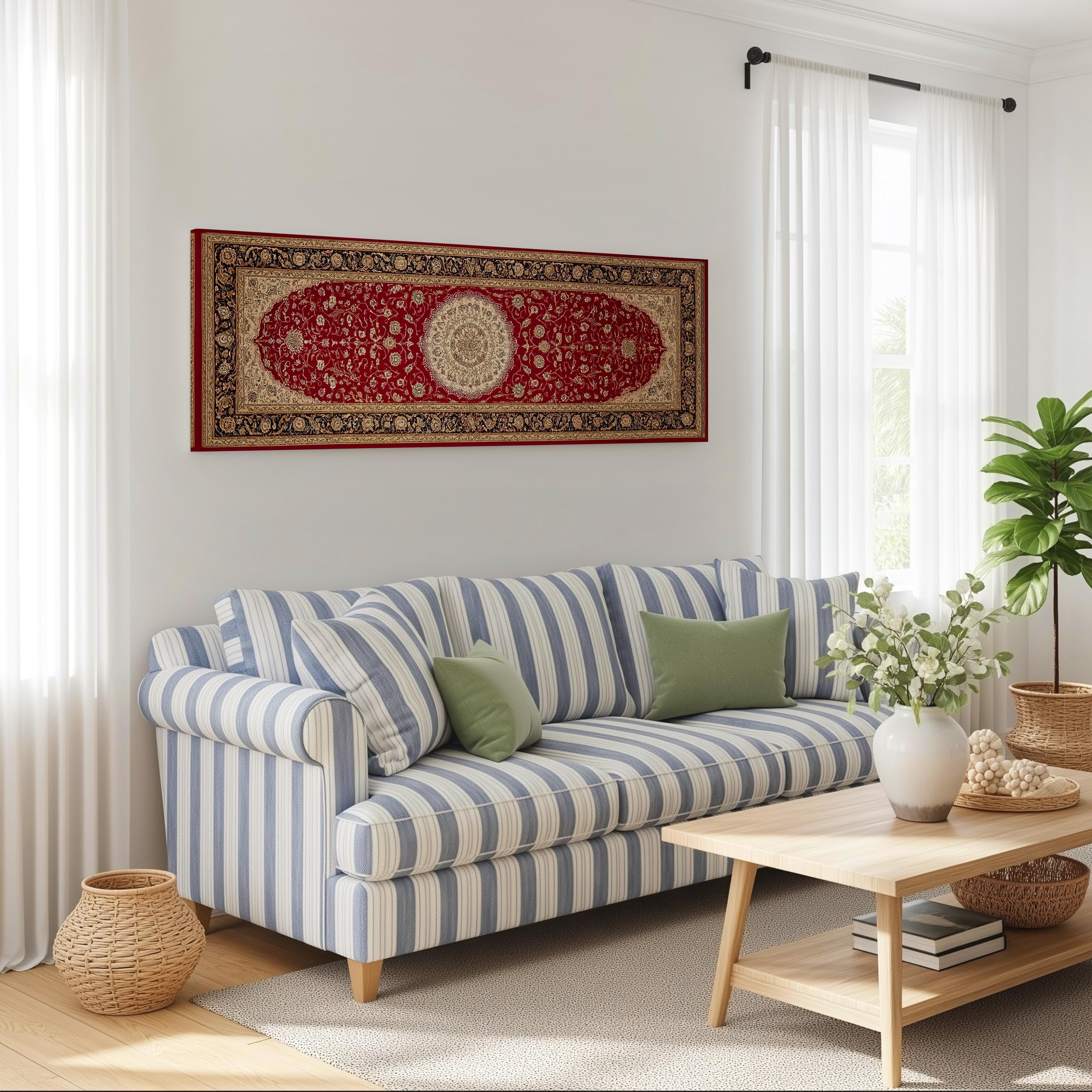 a cozy living room with a striped blue and white sofa, a wooden coffee table, and a large red and gold rug on the wall.