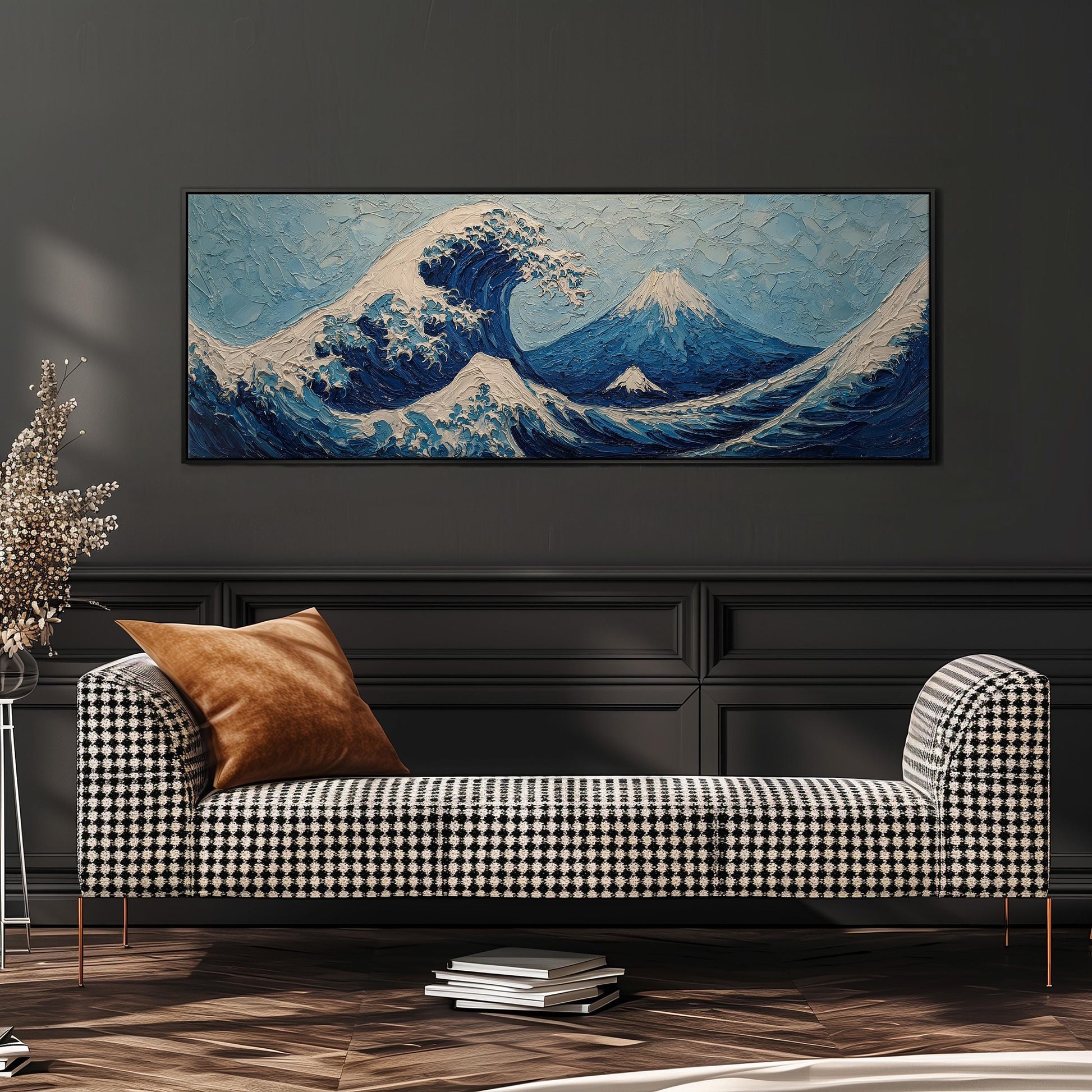 a large, colorful painting of a wave with mountains in the background, hanging on a wall above a black and white checkered sofa.