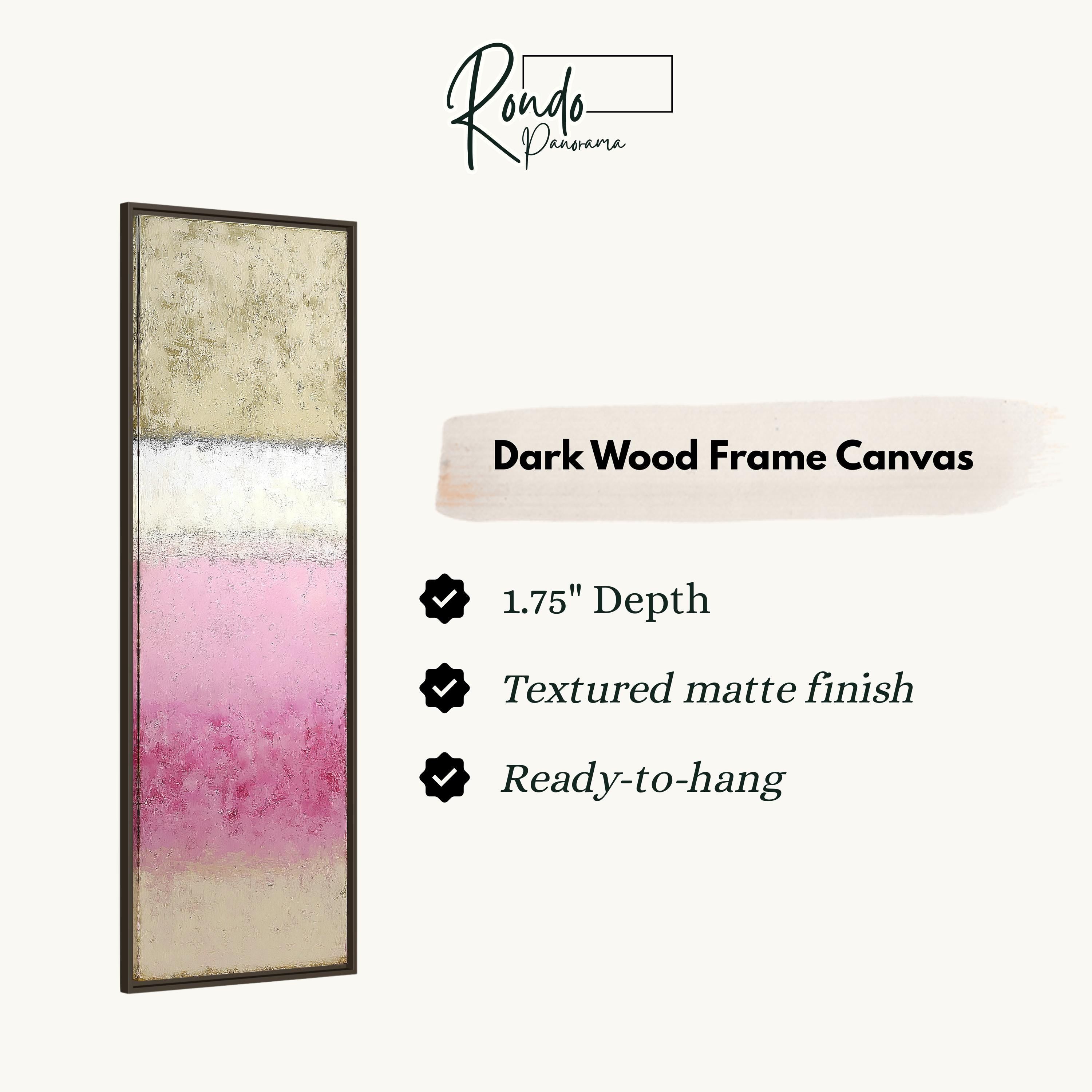 The image is a product description for a dark wood frame canvas. It features a vertical piece of art with a gradient of colors, including pink, white, and beige. The canvas has a 1.75" depth, a textured matte finish, and is ready to hang.