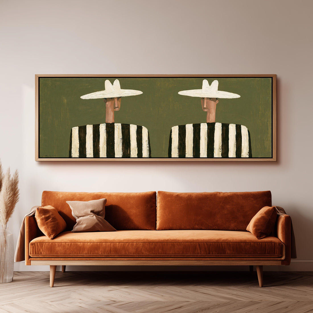 Two figures in striped shirts long horizontal canvas print above a sofa in a living room