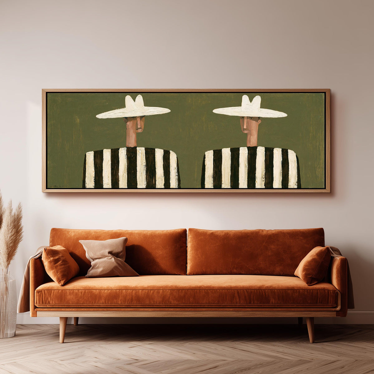 Two figures in striped shirts long horizontal canvas print above a sofa in a living room