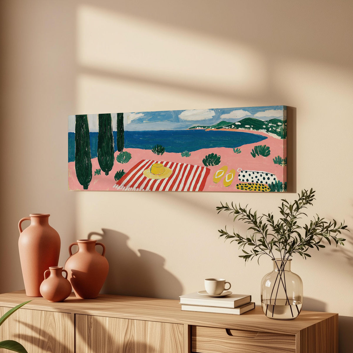 Mediterranean beach day with a striped towel long horizontal canvas print above a wooden sideboard