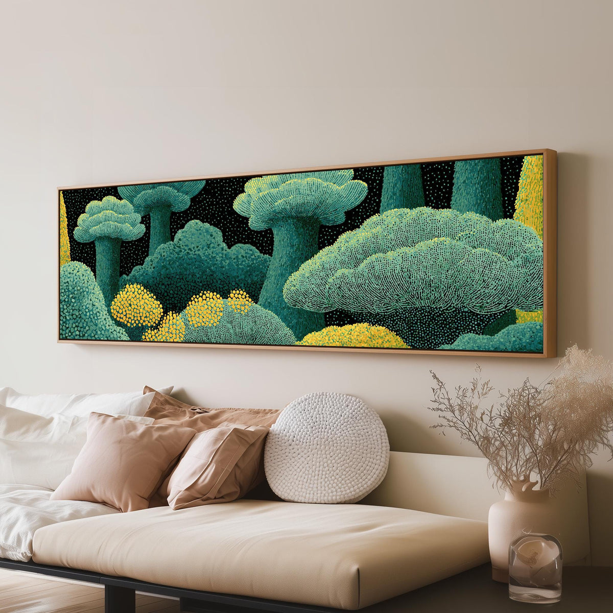 Teal dotted treetops long horizontal canvas print above a sofa in a living room