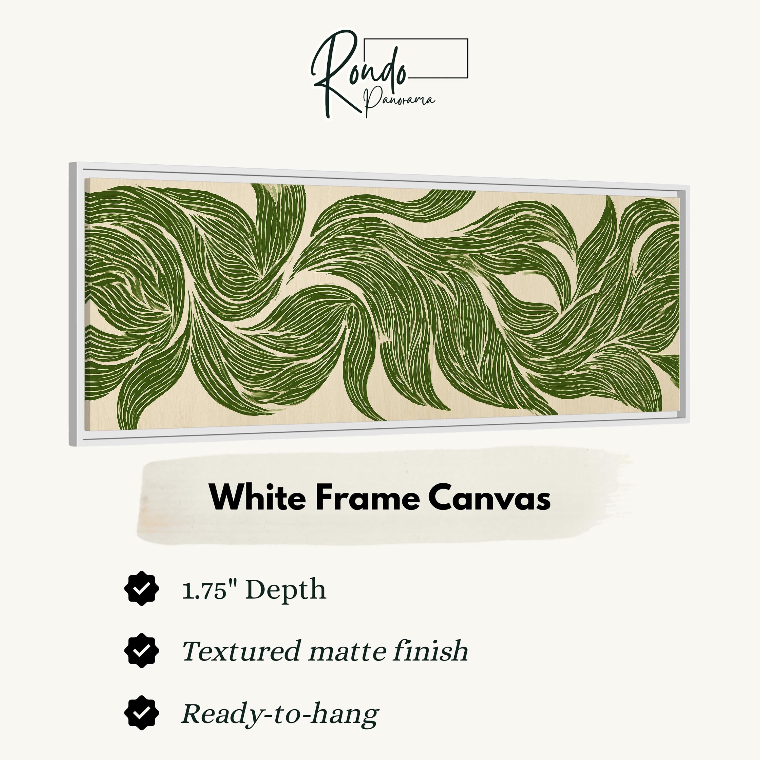 a white frame canvas with a green leaf pattern.
