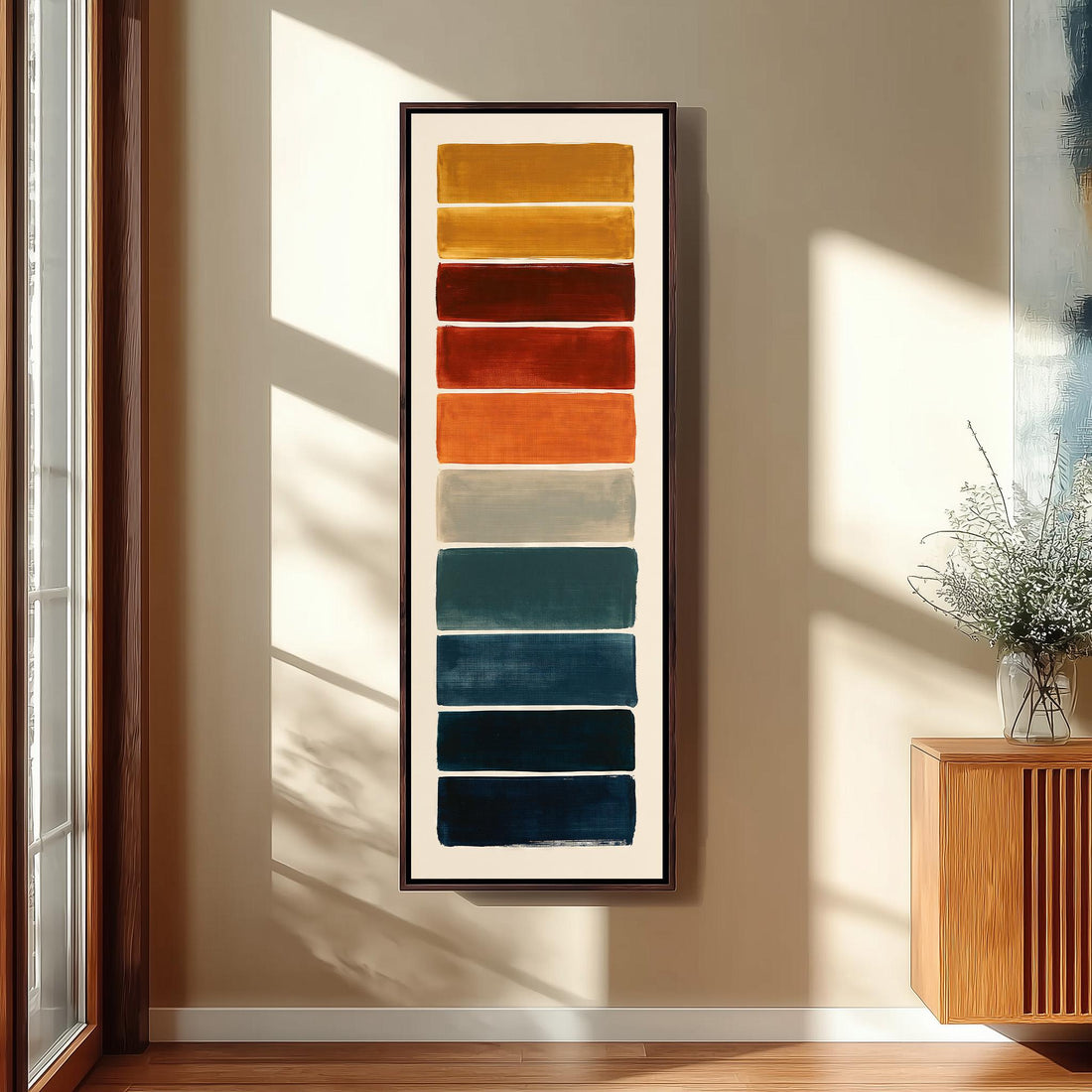 Stack of swatches from mustard to navy long vertical canvas print in a sunlit living space