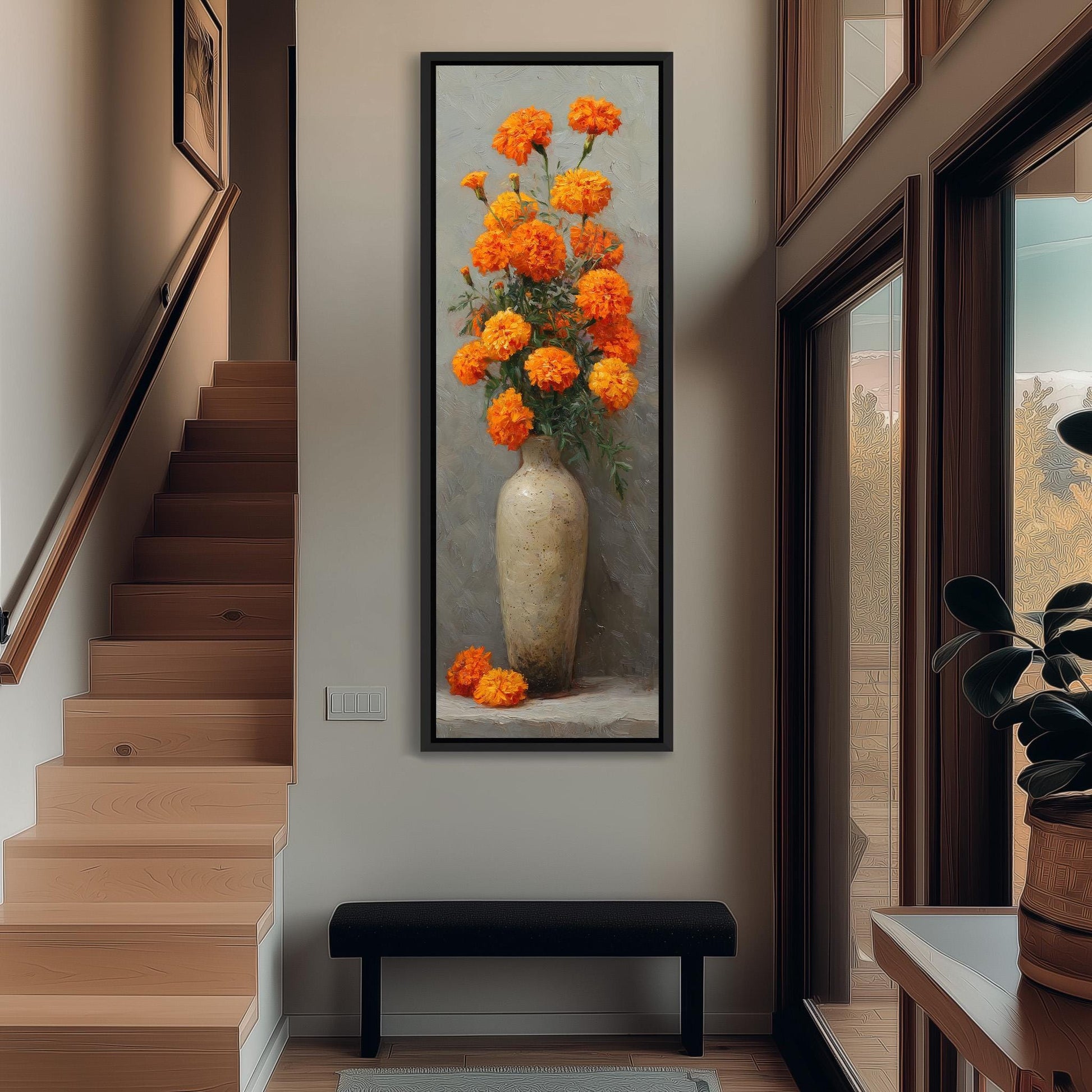 a large painting of a vase filled with orange flowers hanging on a wall in a hallway.