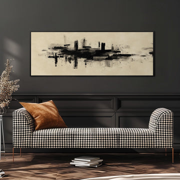 a modern living room with a black and white checkered sofa, a large abstract painting on the wall, and a stack of books on the floor.
