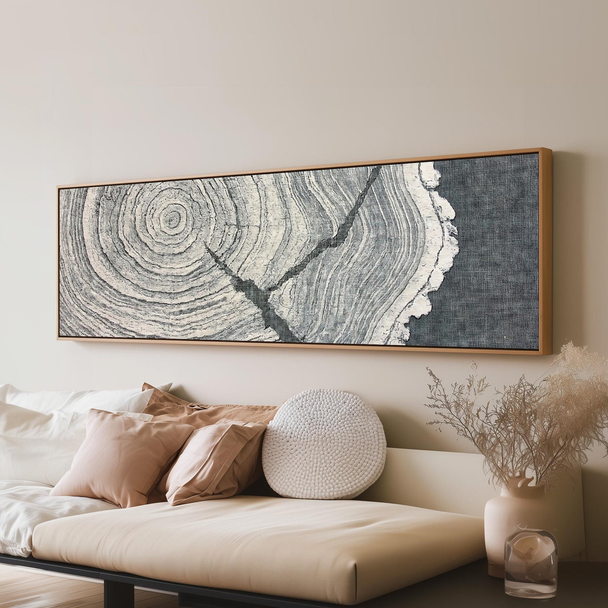 Grey tree ring on linen texture panoramic canvas print above a sofa in a living room